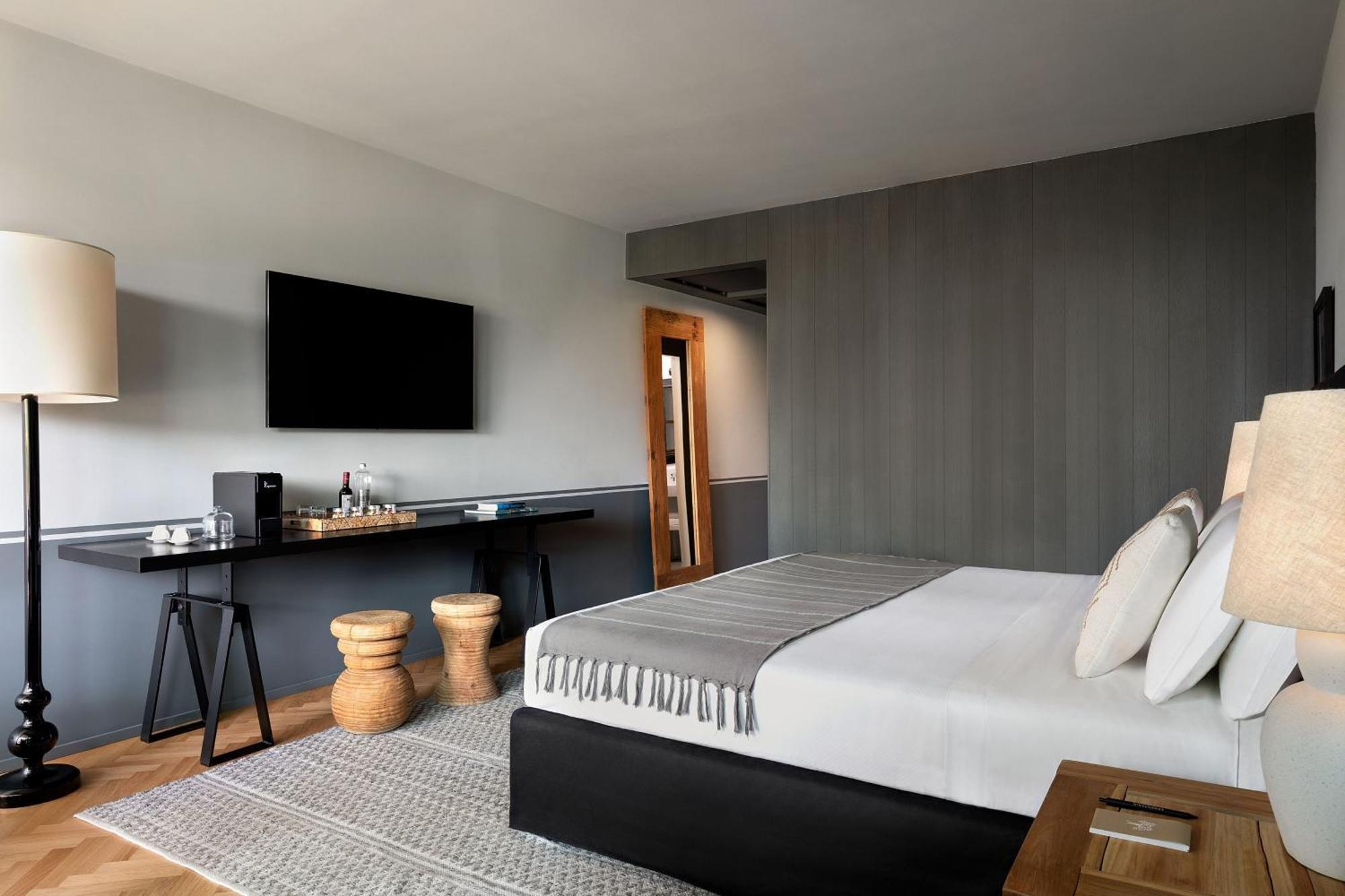 Junior Suite Doppia con Letti Singoli con Balcone e Vista Giardino
