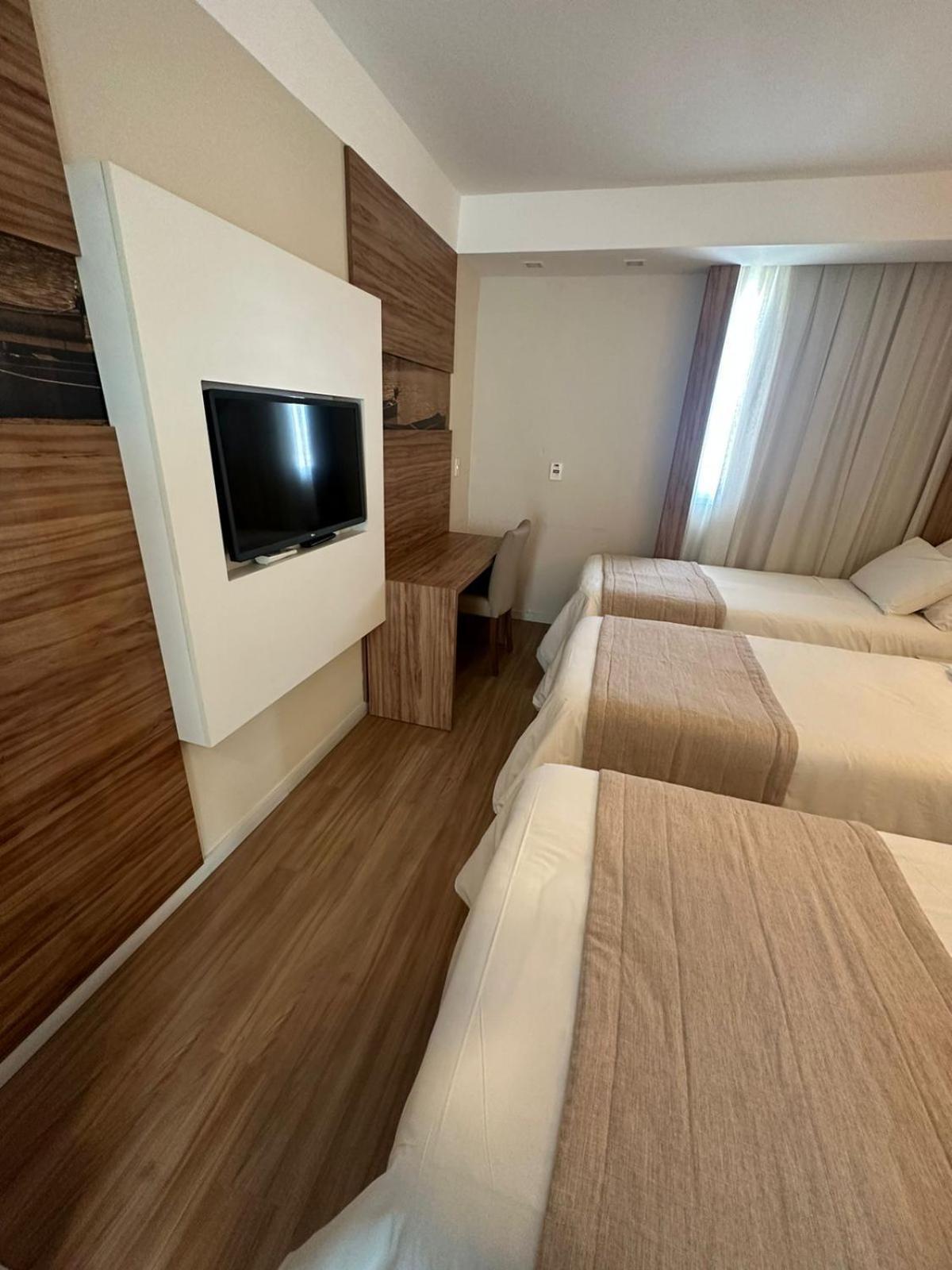Quarto Triplo Luxo