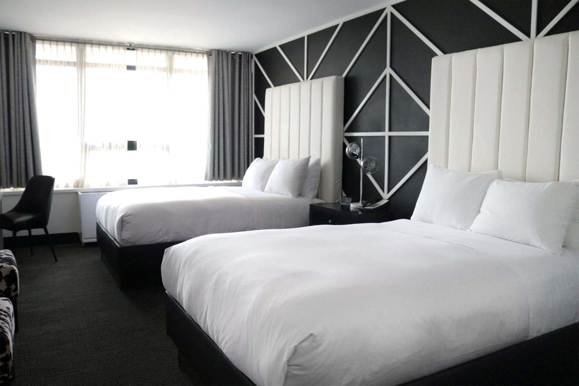 Double Room Mobility or Hearing Access Two Double Beds andTub Grab Bars Non-Smoking
