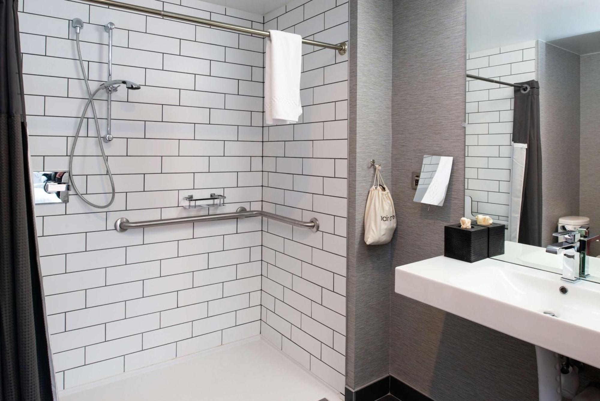 Deluxe King Room Roll Shower Mobility Accessible
