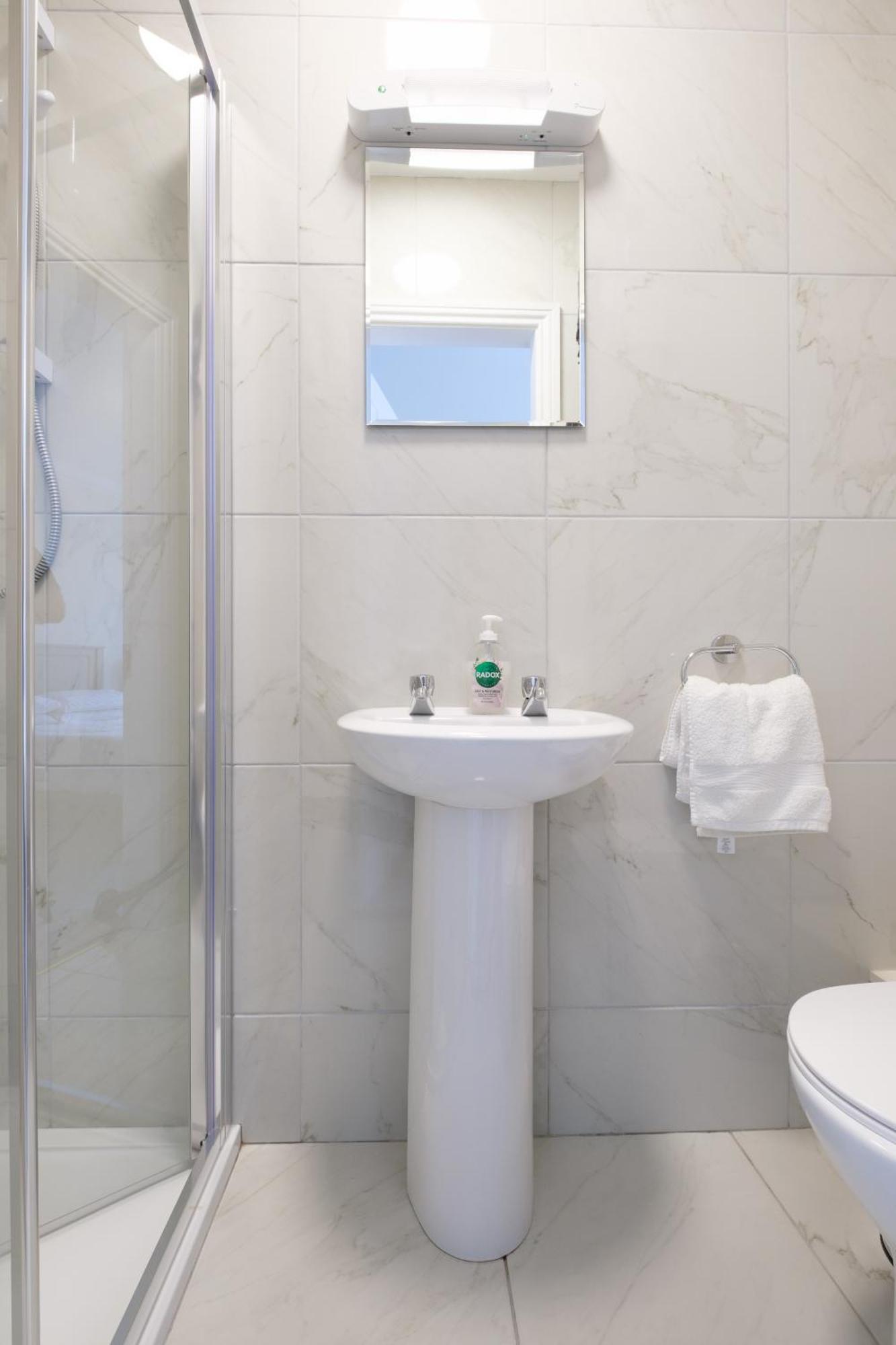 Habitación Cuádruple con ducha