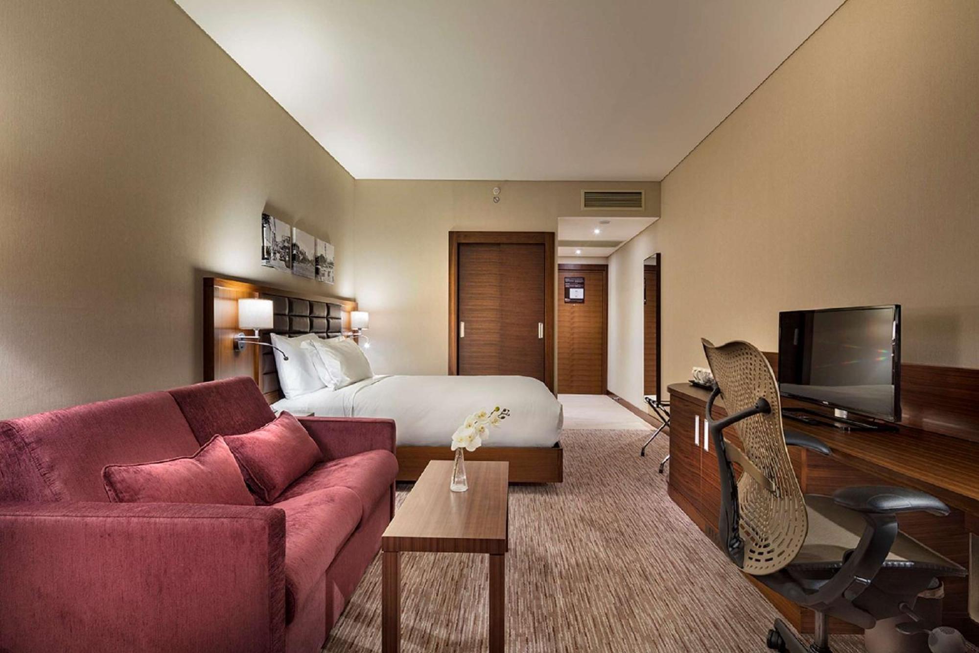 Zimmer mit Queensize-Bett und Meerblick