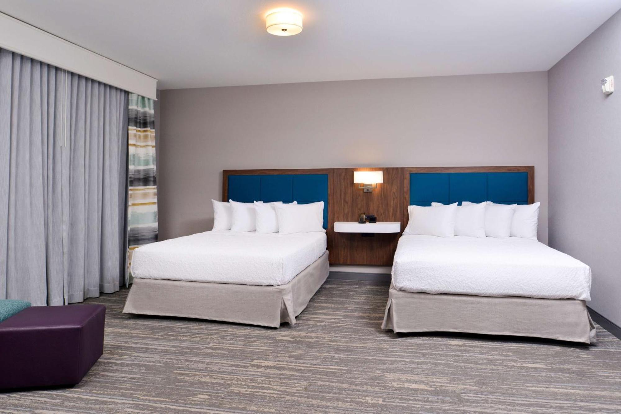 Suite Two Queen Beds Bath Tub Mobility Hearing Access or Non-Smoking