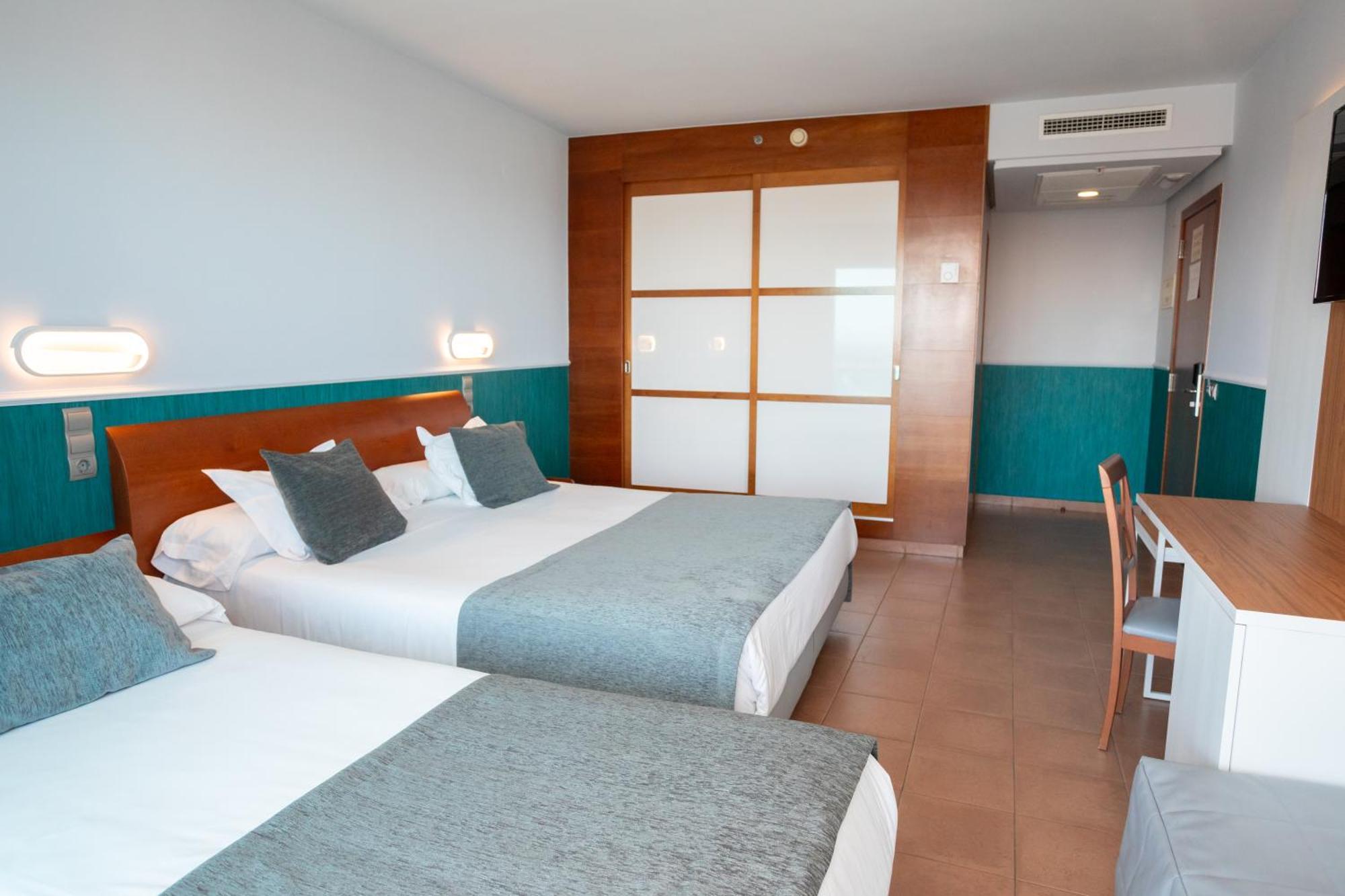 Habitación Doble con 2 camas (2 adultos + 1 niño)