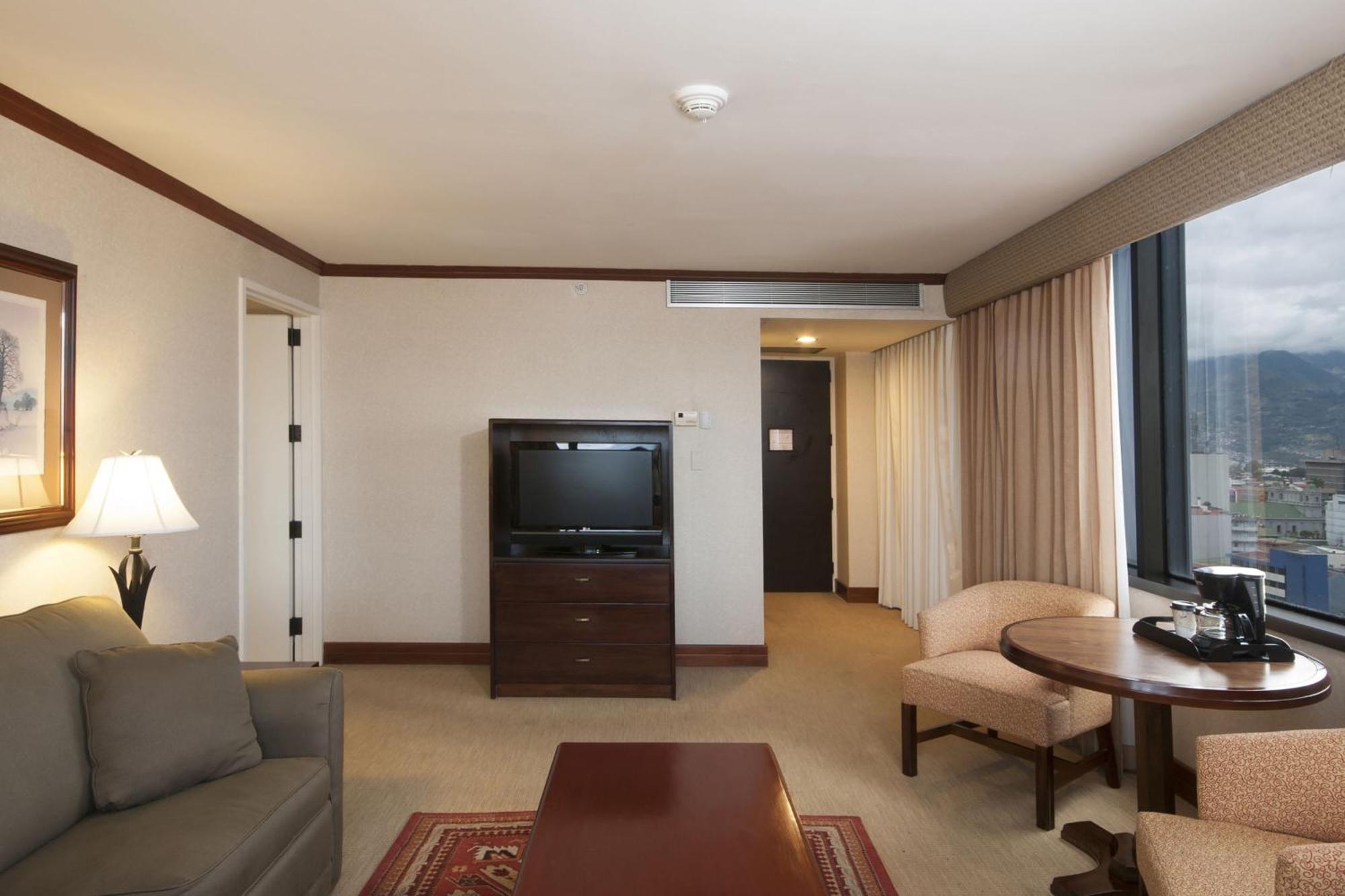 Suite Executive con sofá cama y vistas a la ciudad - Cama extragrande