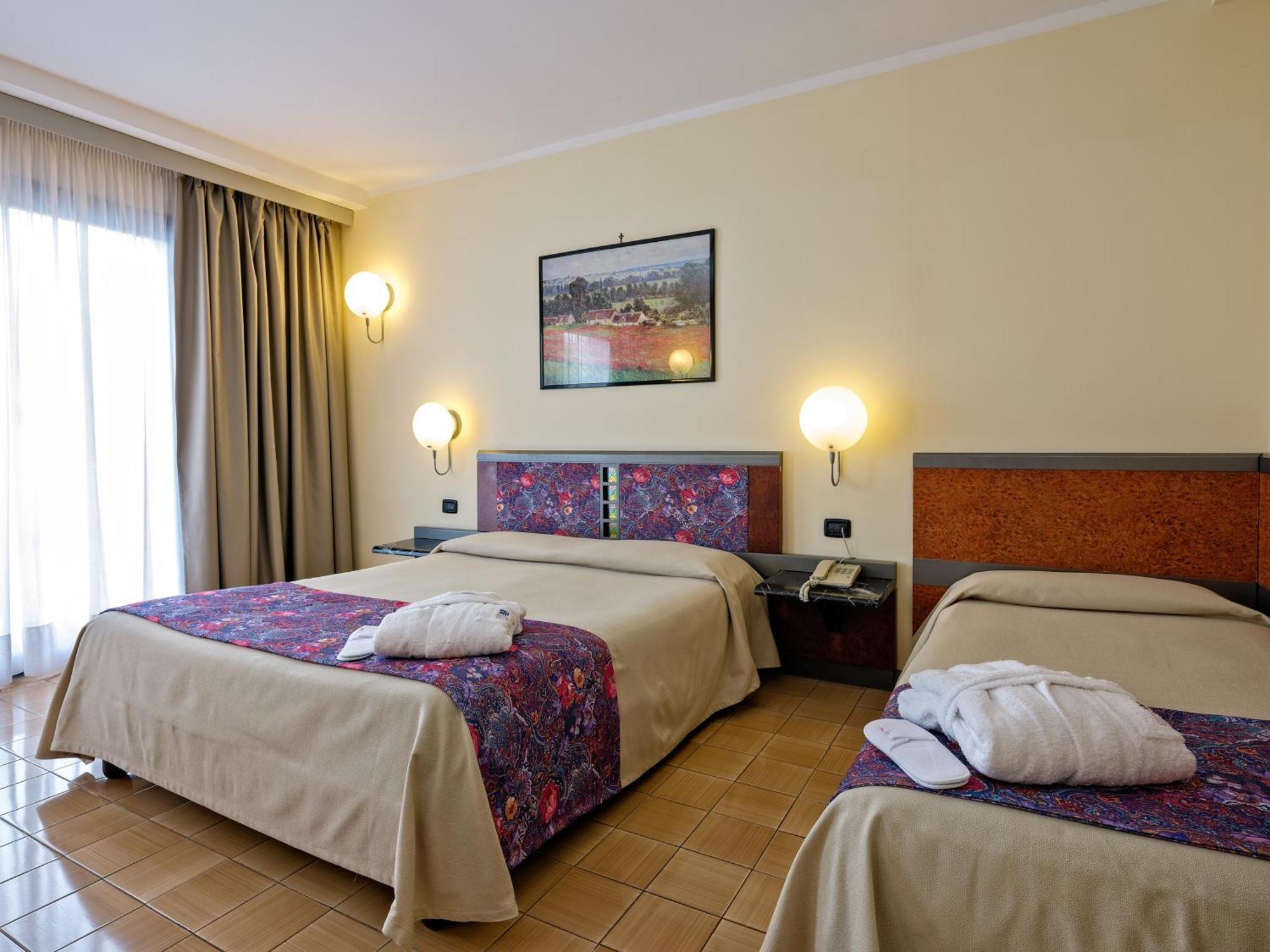 Deluxe Triple Room Balcony