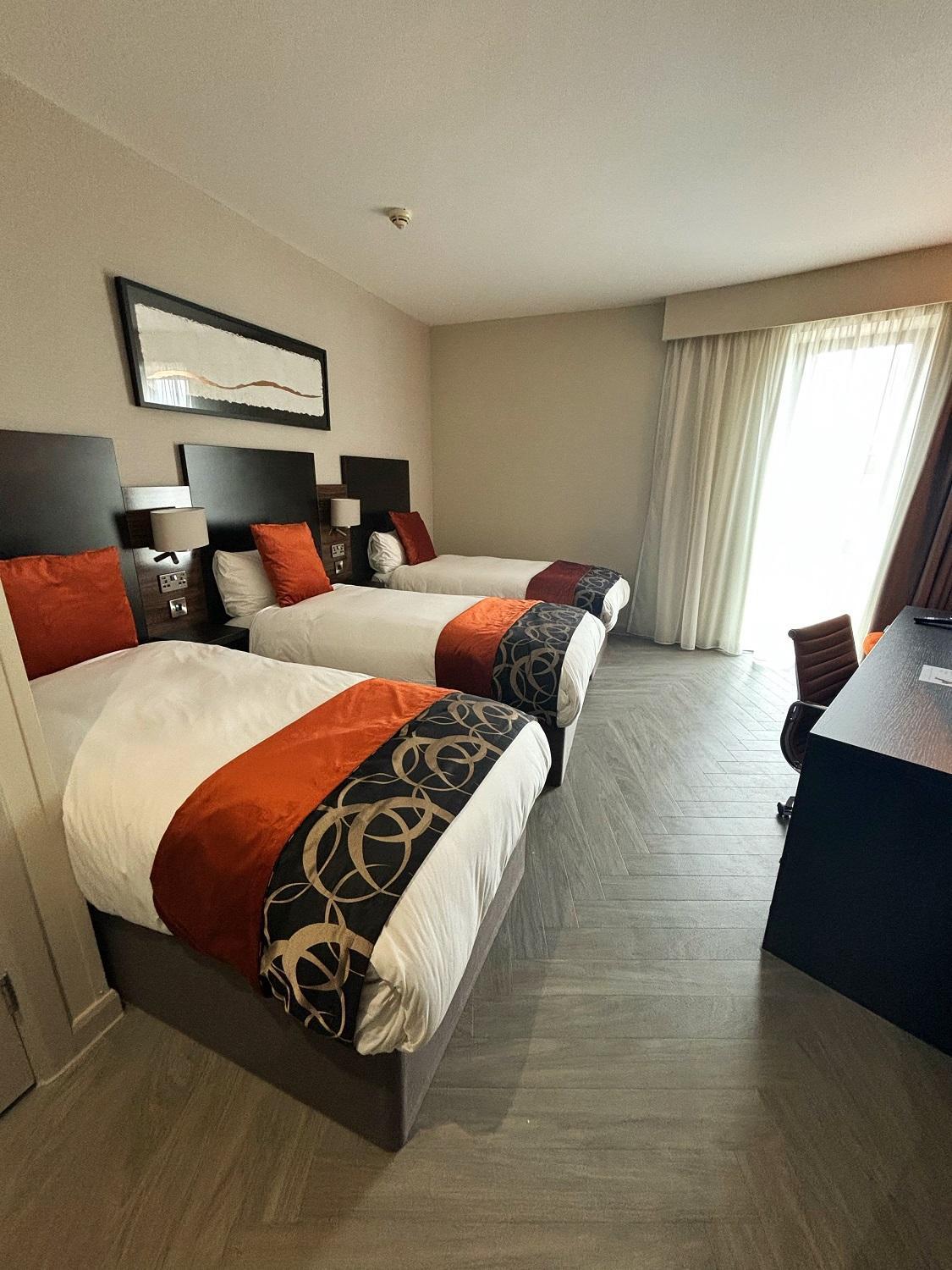 Deluxe Dreibettzimmer