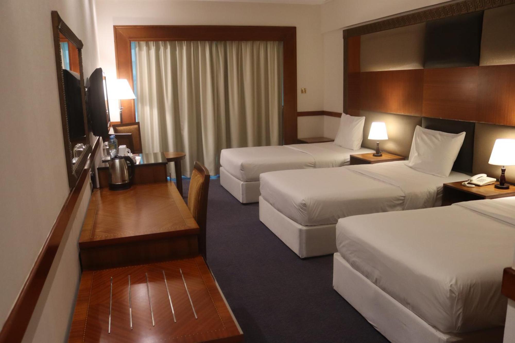 Deluxe Triple Room