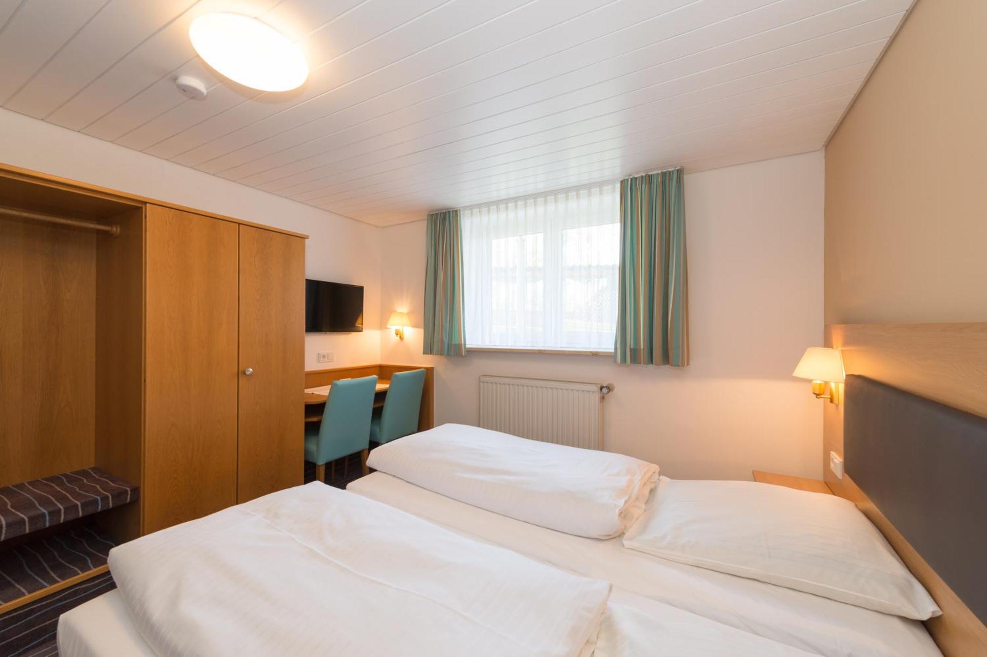 Dreibettzimmer