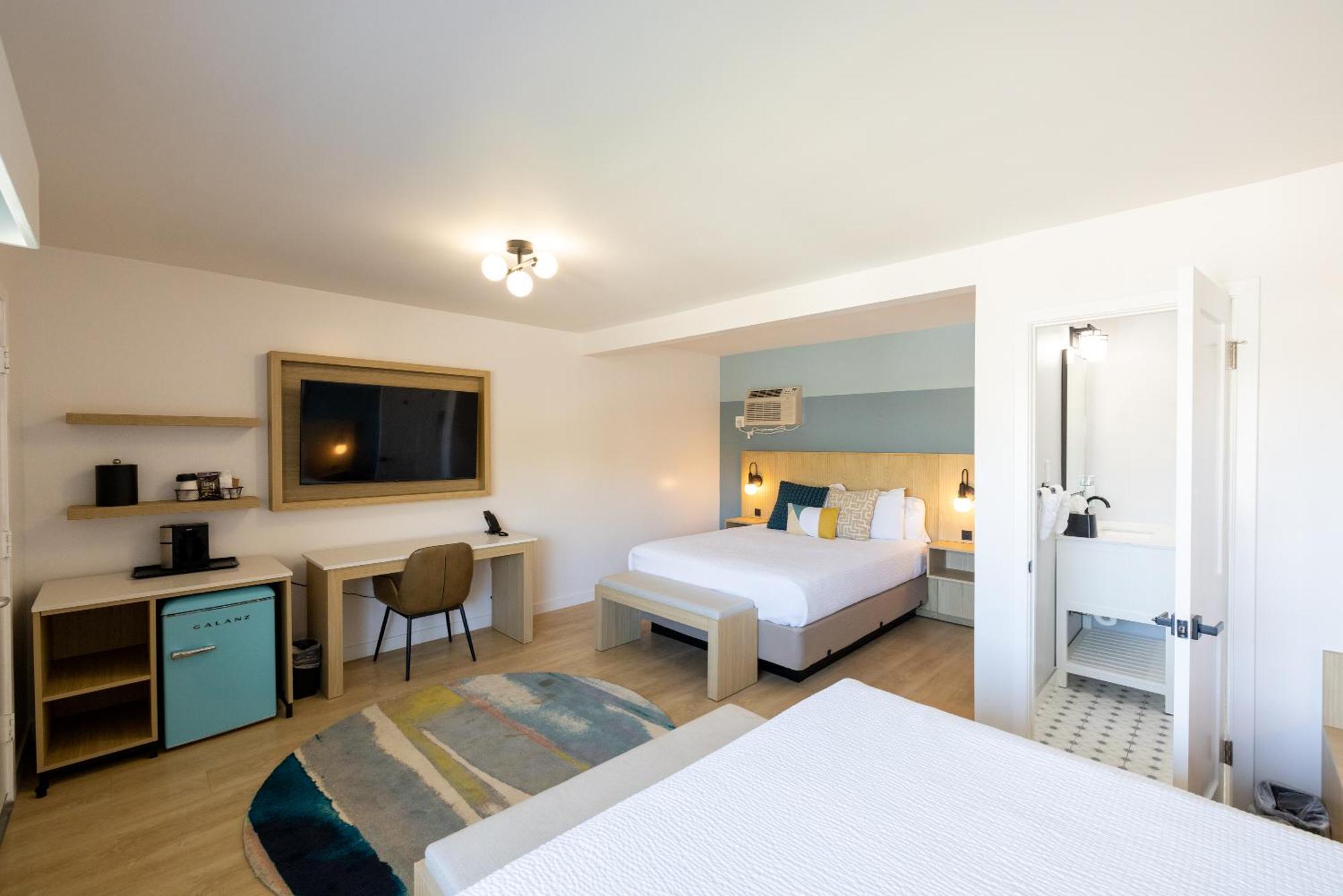 Two Queen Beds Partial Ocean View