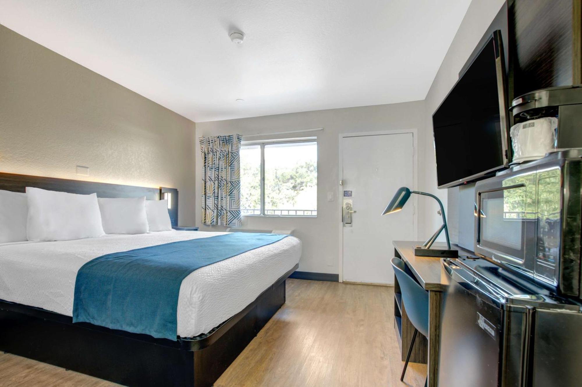 1 King Bed | Premium Micfridge