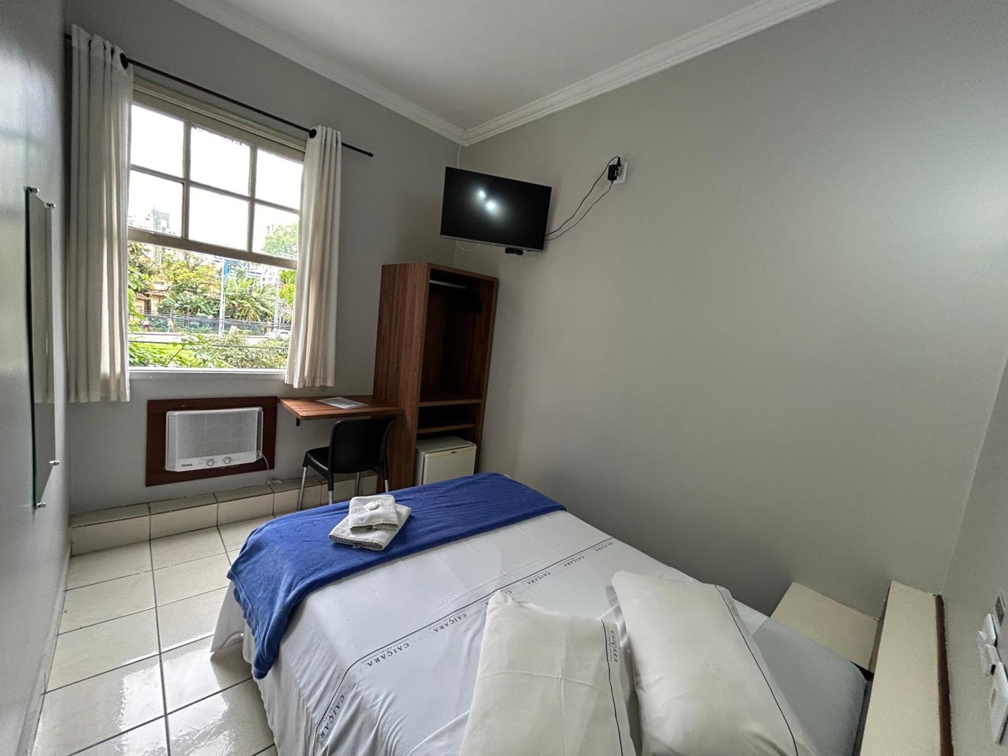 Quarto Duplo com Cama de Casal