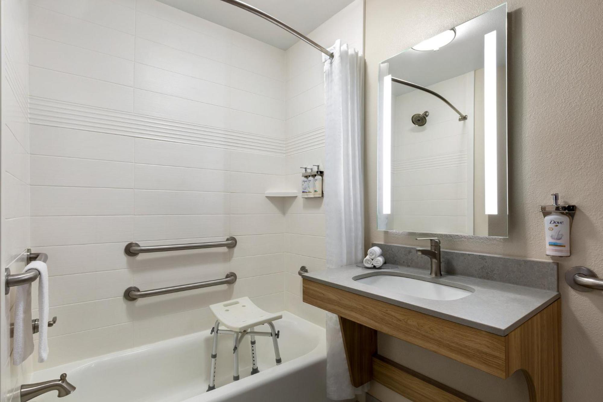 Studio Queen Suite Communications Accessible Tub