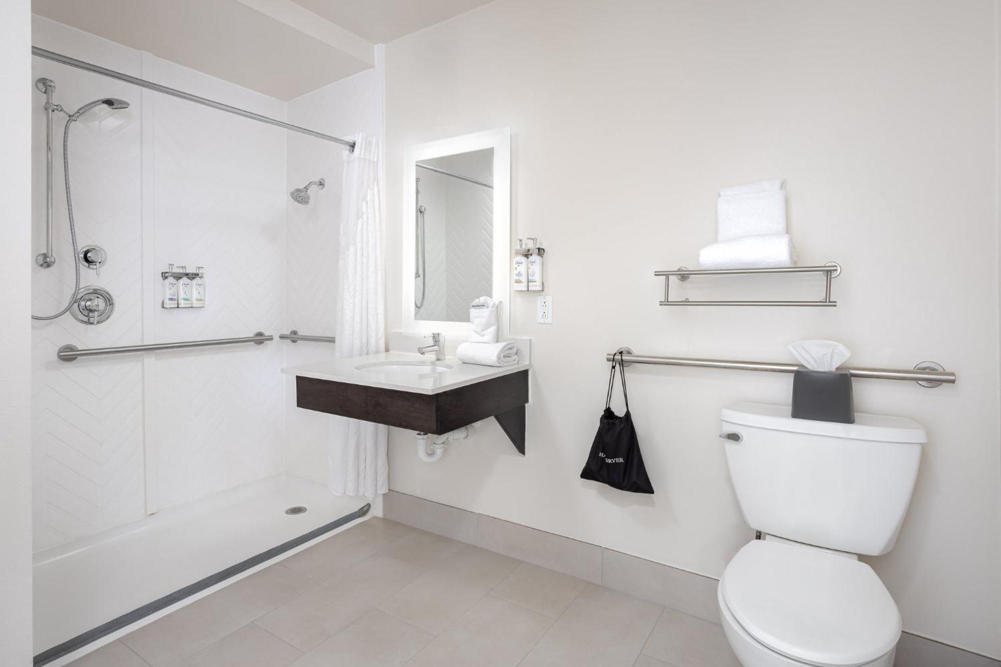 Standard Queen Room Communications Accessible Roll Shower