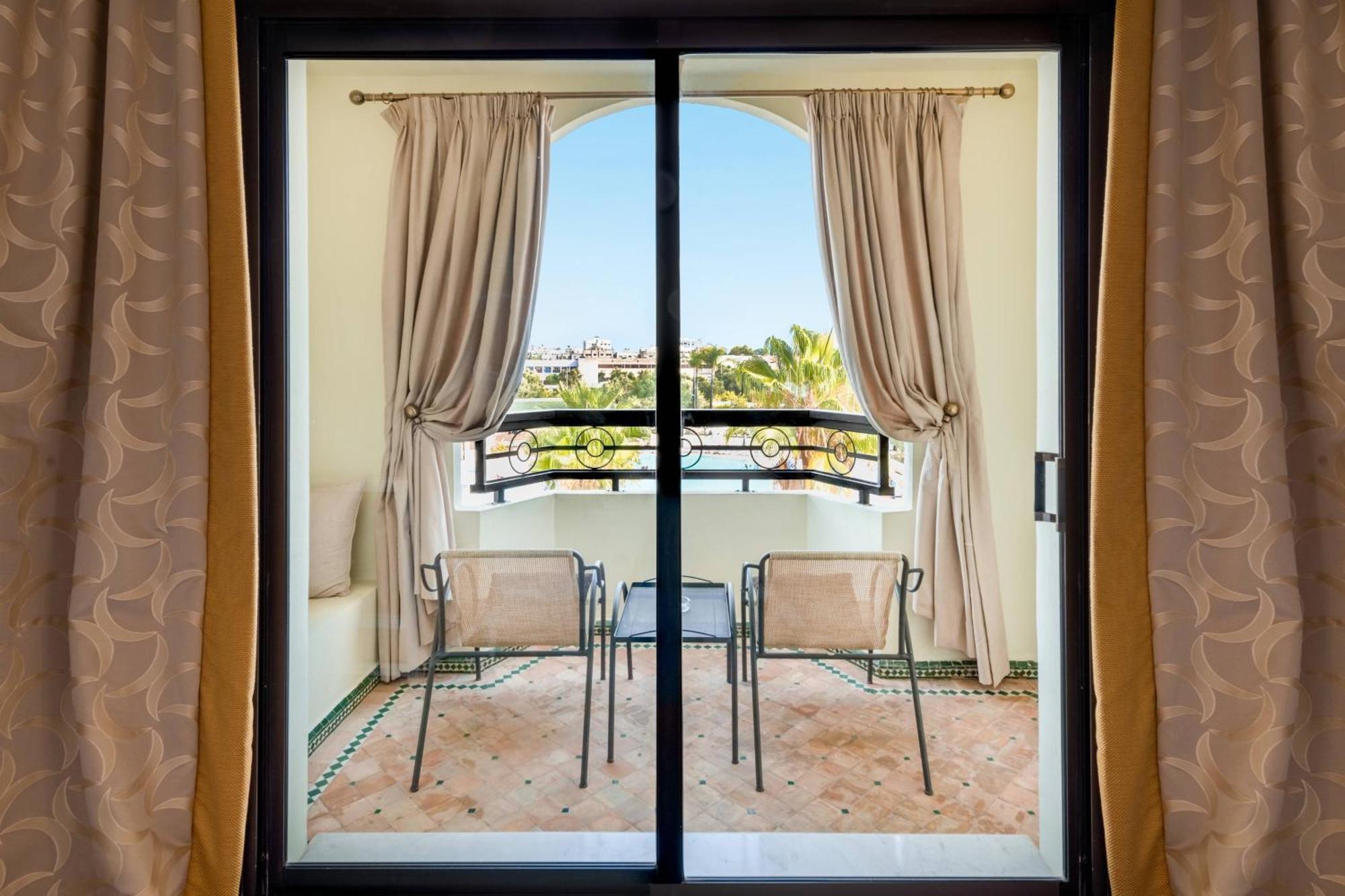 Deluxe Room Guest room 1 King Pool view Balcony