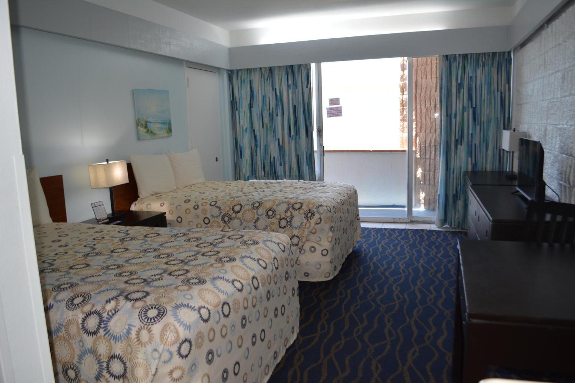 Standard Room Two Double Beds North Partial Ocean View