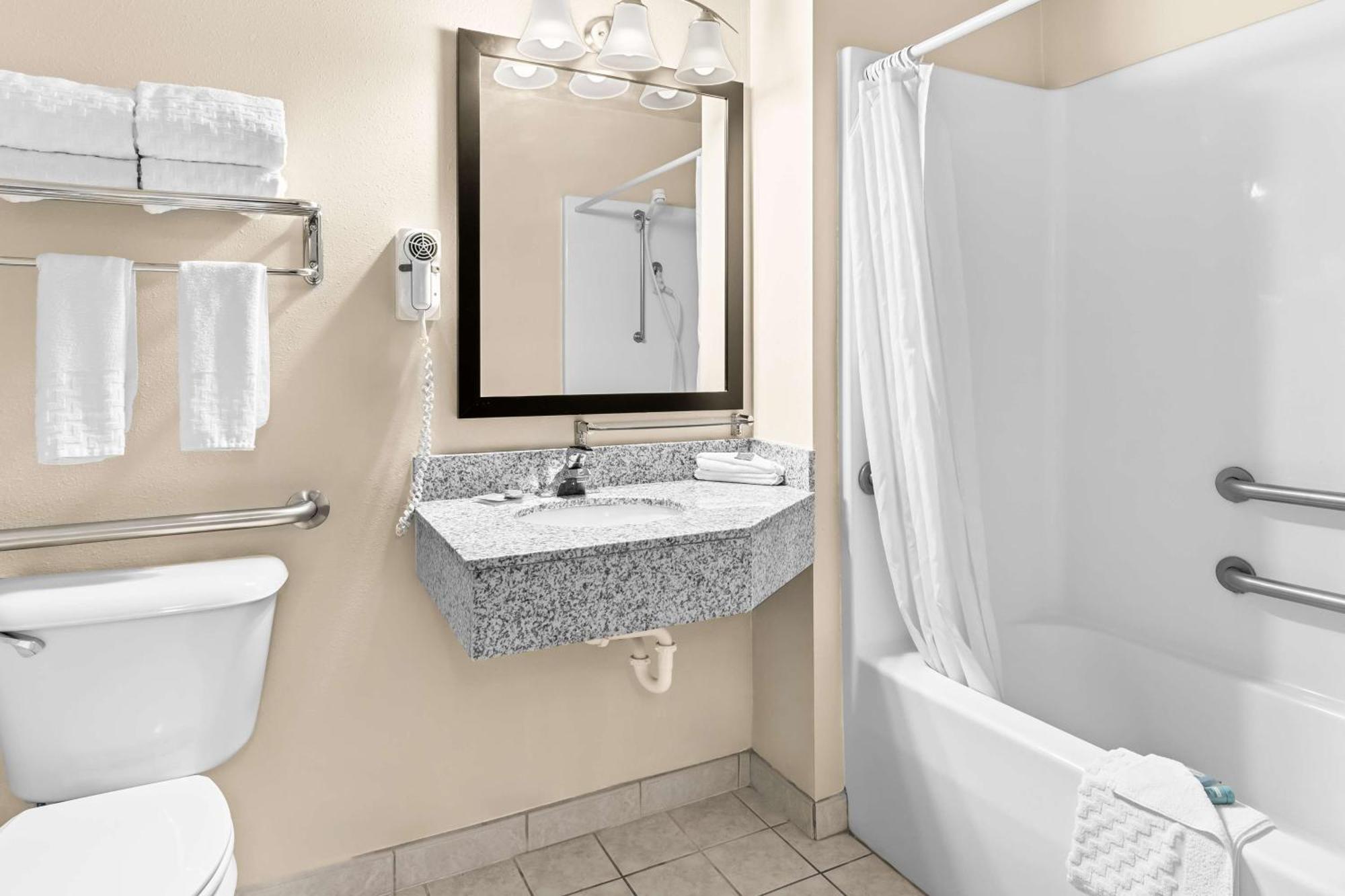 Two-Room King Suite Bath Tub Sofa Bed Disability Access or Non-Smoking