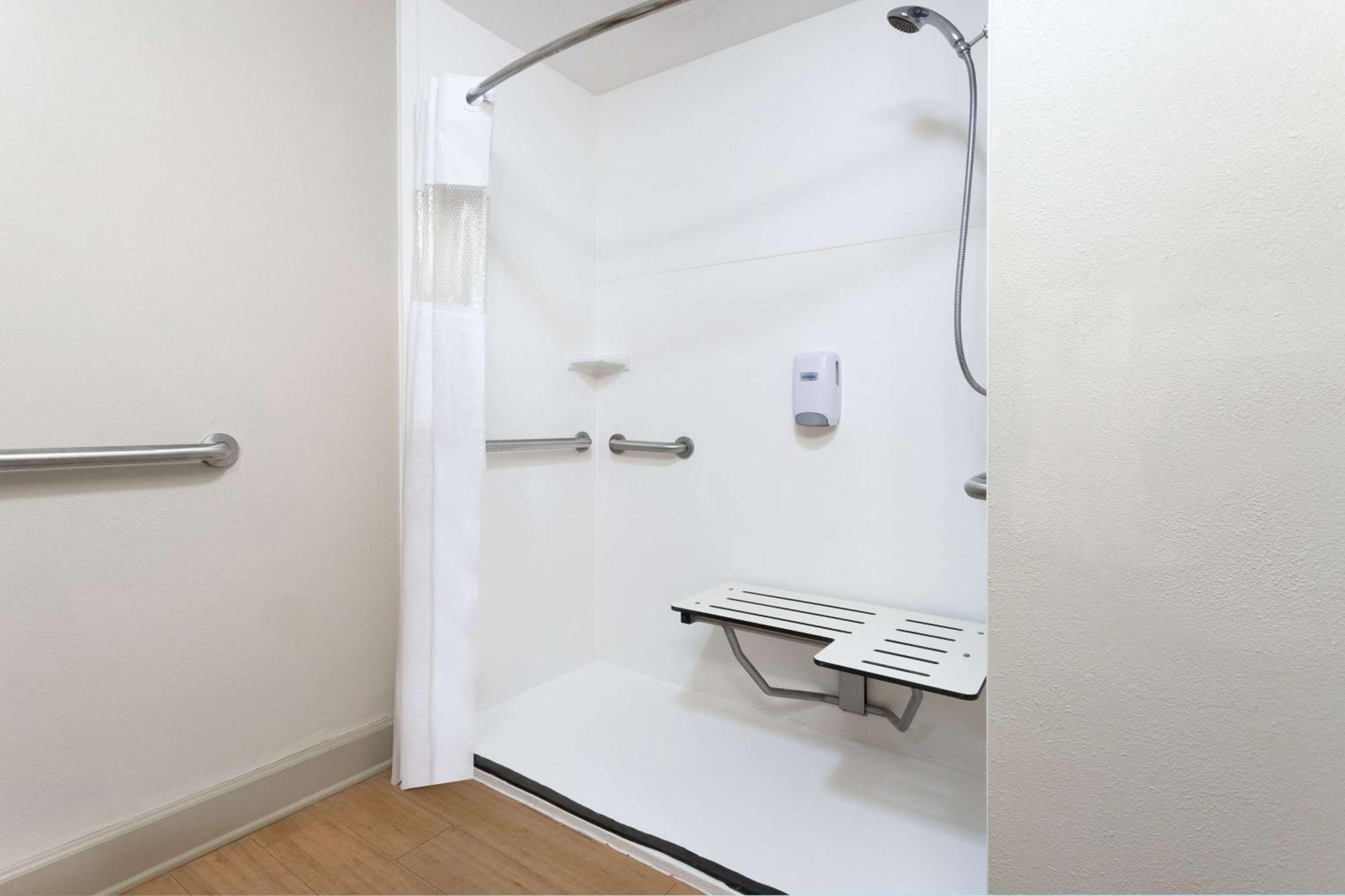King Room One King Bed Roll Shower Grab Bars Mobility Accessible Non-Smoking