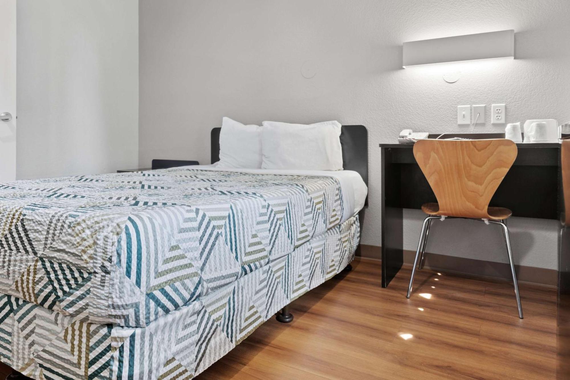 1 Queen Bed | Mini Fridge | Outdoor Pool