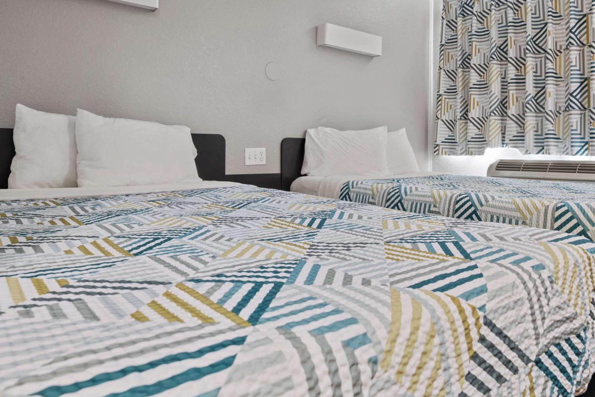 1 Full Bed | ADA or RI Shower or Mini Fridge | Outdoor Pool