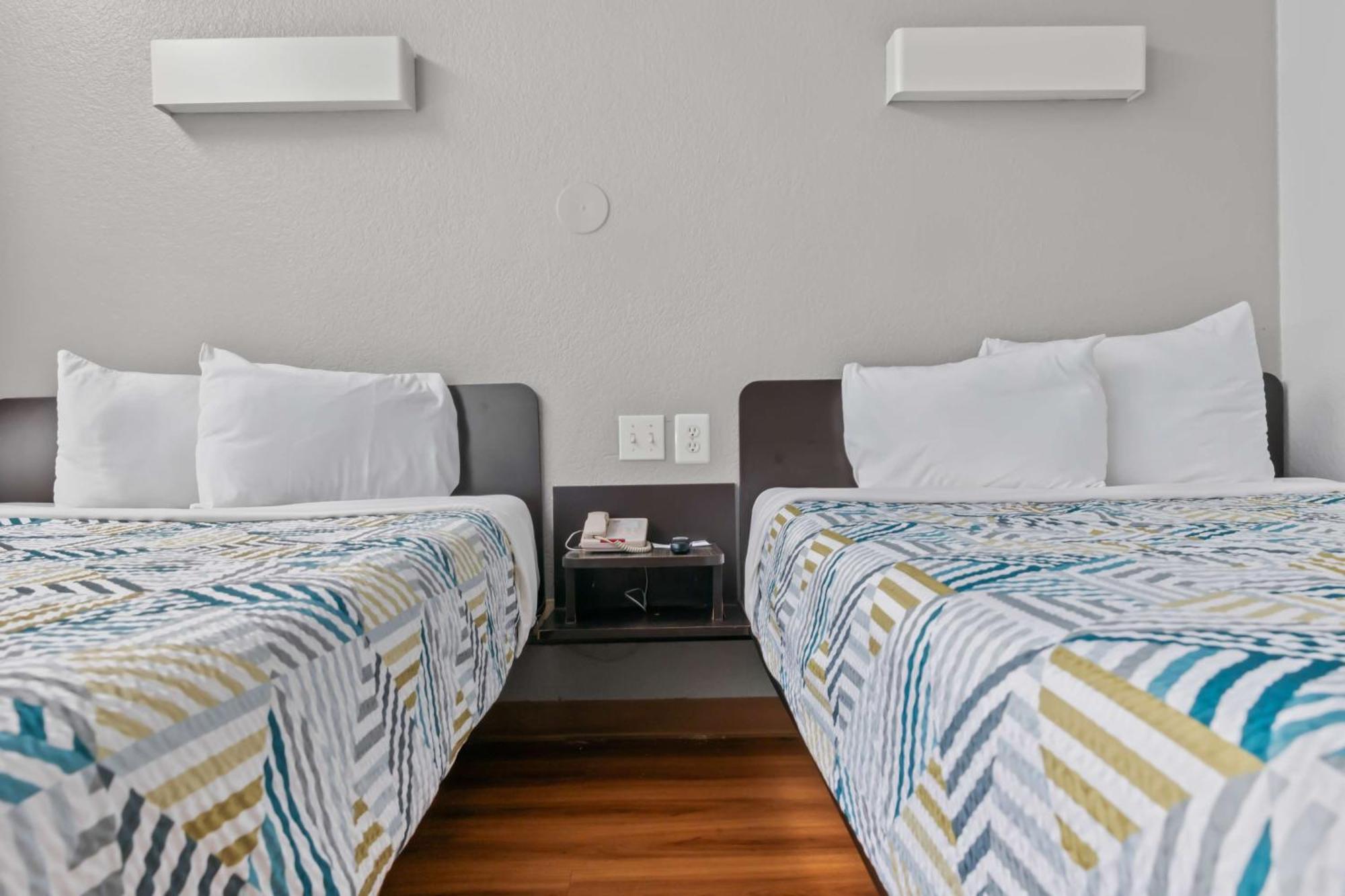 1 Full Bed | ADA or RI Shower or Mini Fridge | Outdoor Pool