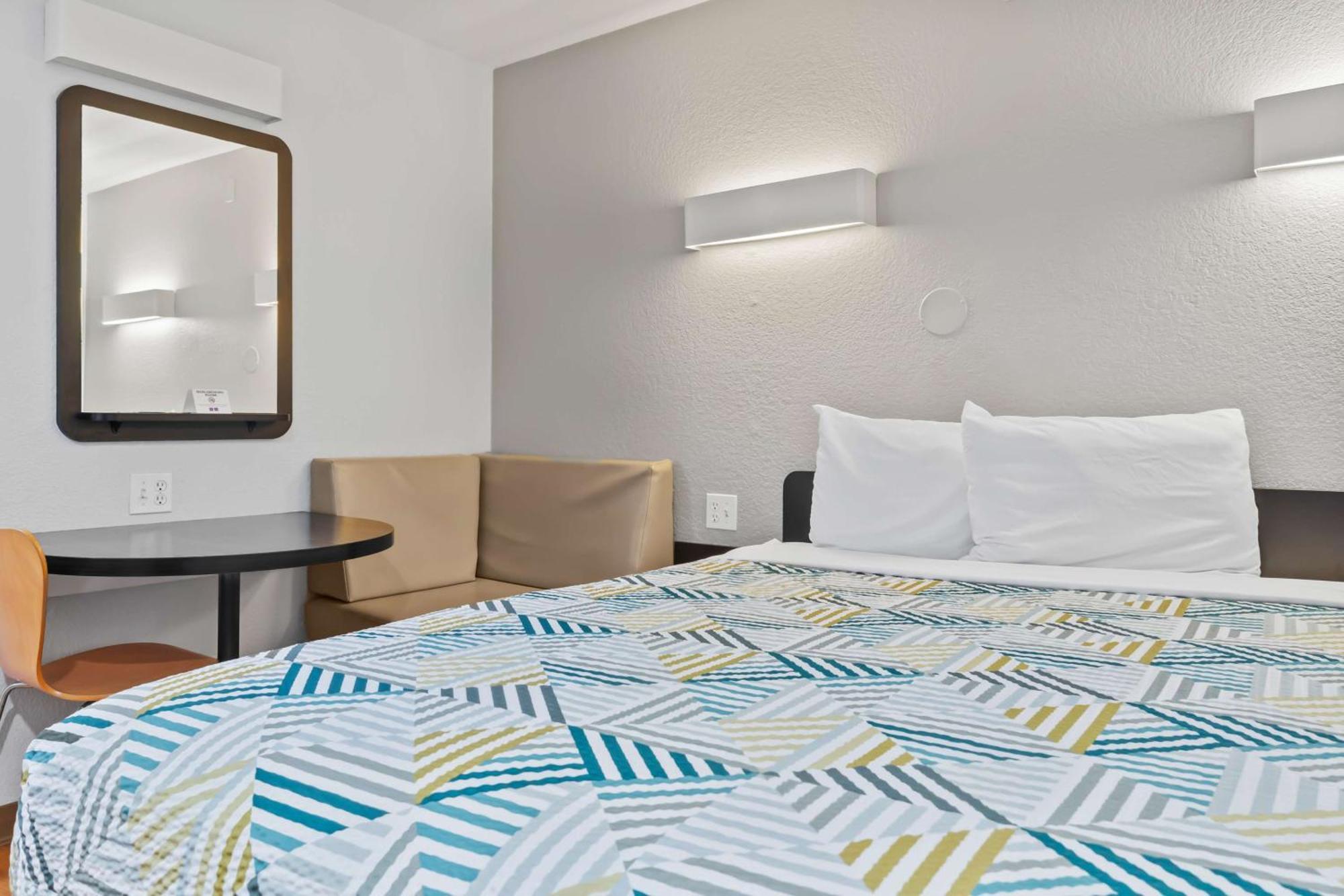 1 Queen Bed | Mini Fridge | Outdoor Pool