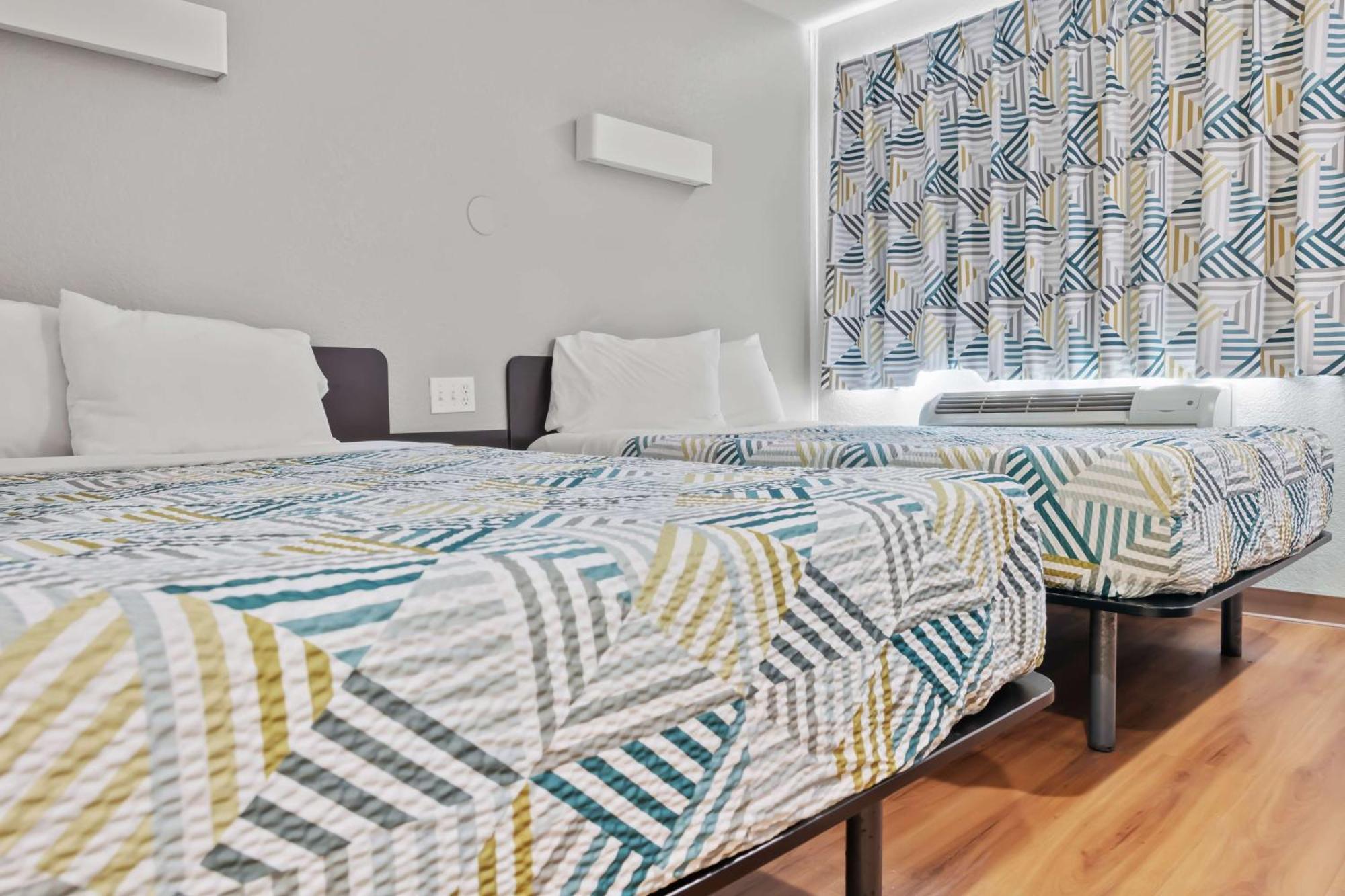 1 Full Bed | ADA or RI Shower or Mini Fridge | Outdoor Pool