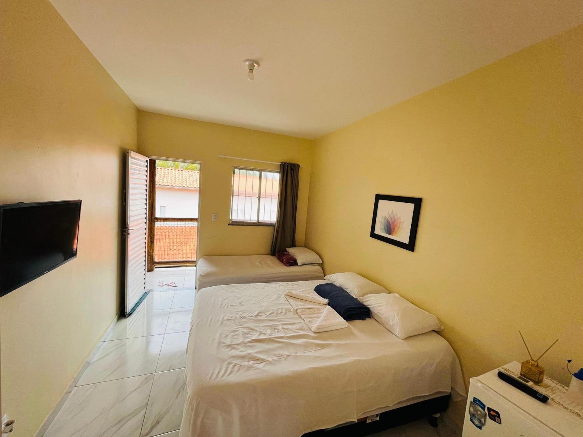 Quarto Triplo com Vista do Jardim