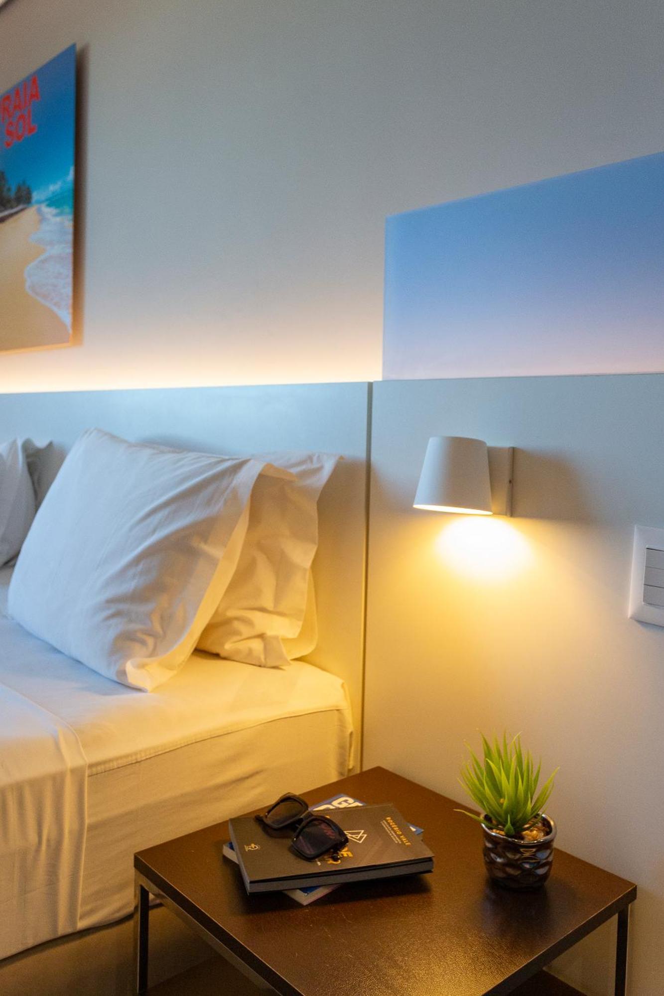 Quarto duplo de luxo com cama king-size