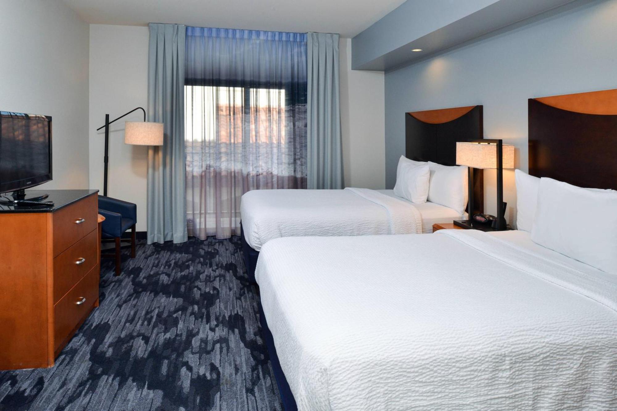 One-Bedroom Queen Suite with Two Queen Beds, Balcony and Sofa Bed