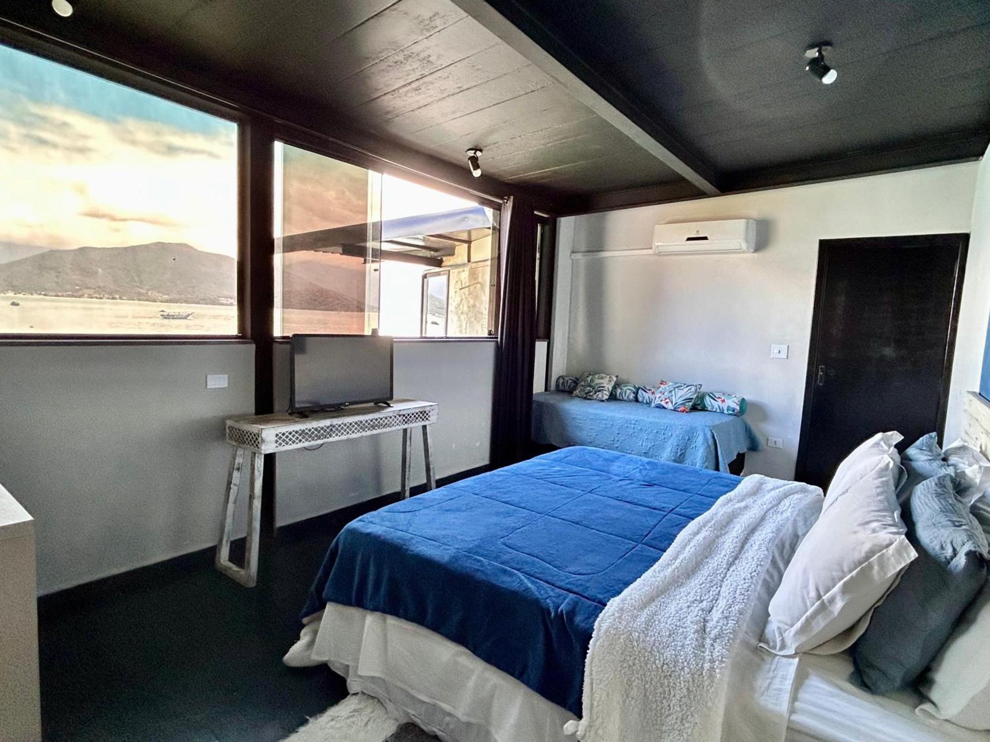 Quarto Família com Vista do Mar