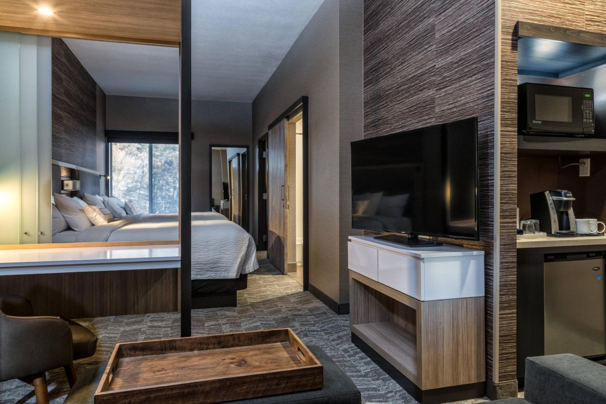 Queen Suite Two Queen Beds Roll Shower Trundle Sofa Mobility Access or Hearing Accessible