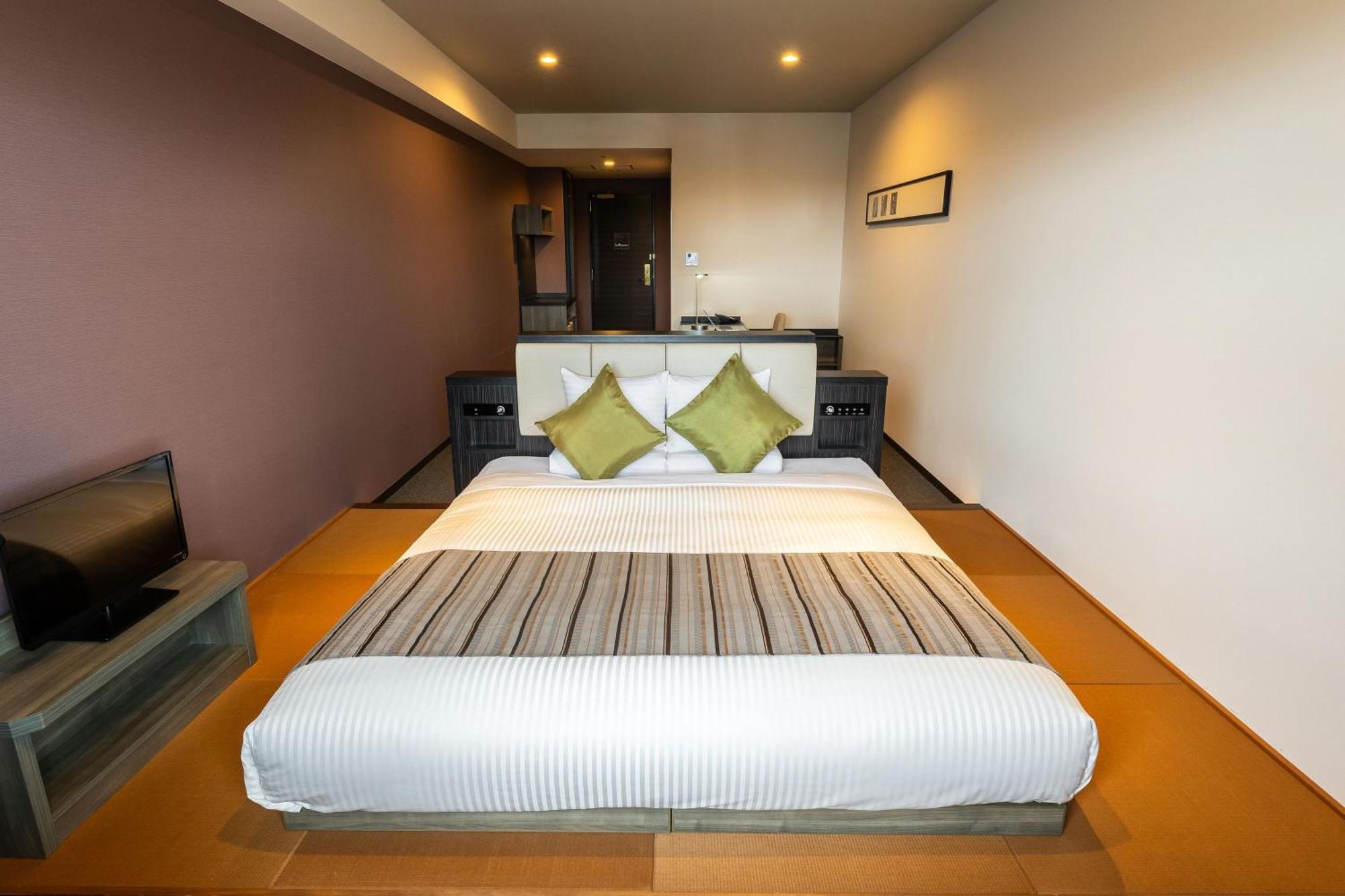 Deluxe King Room Non-Smoking Eco Plan No Room Cleaning Service