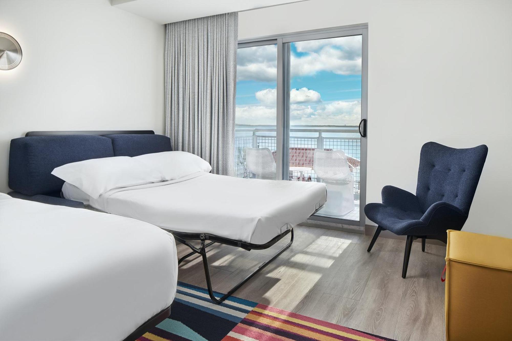 King Room Waterfront View Two Sofa Beds Balcony