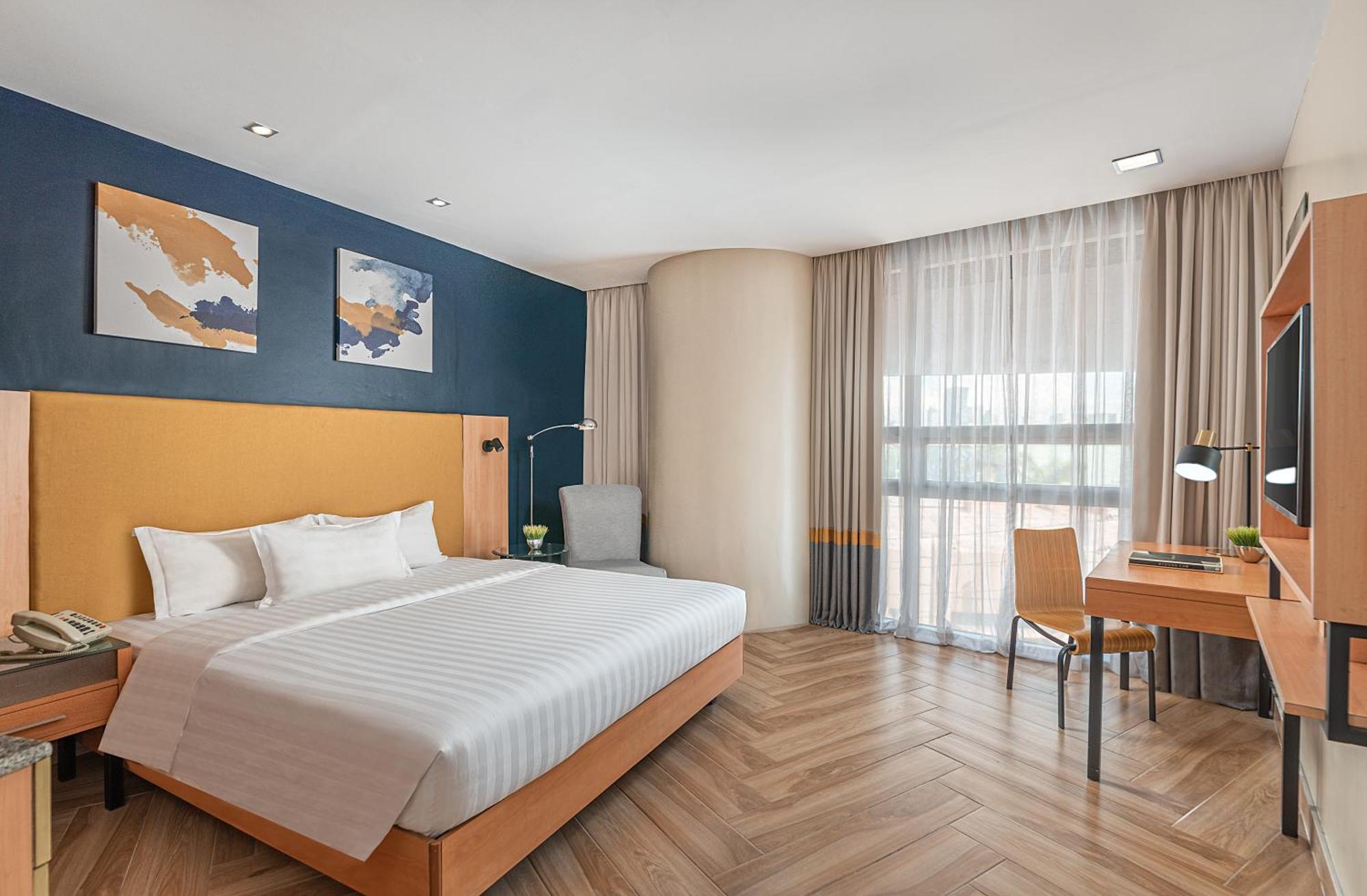Chambre Lit Queen-Size Deluxe