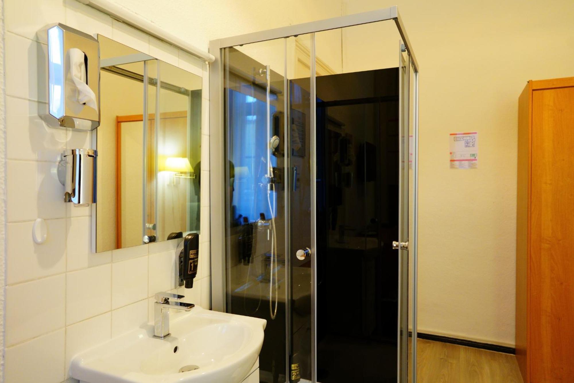 Single Room Private Shower Shared Toilet