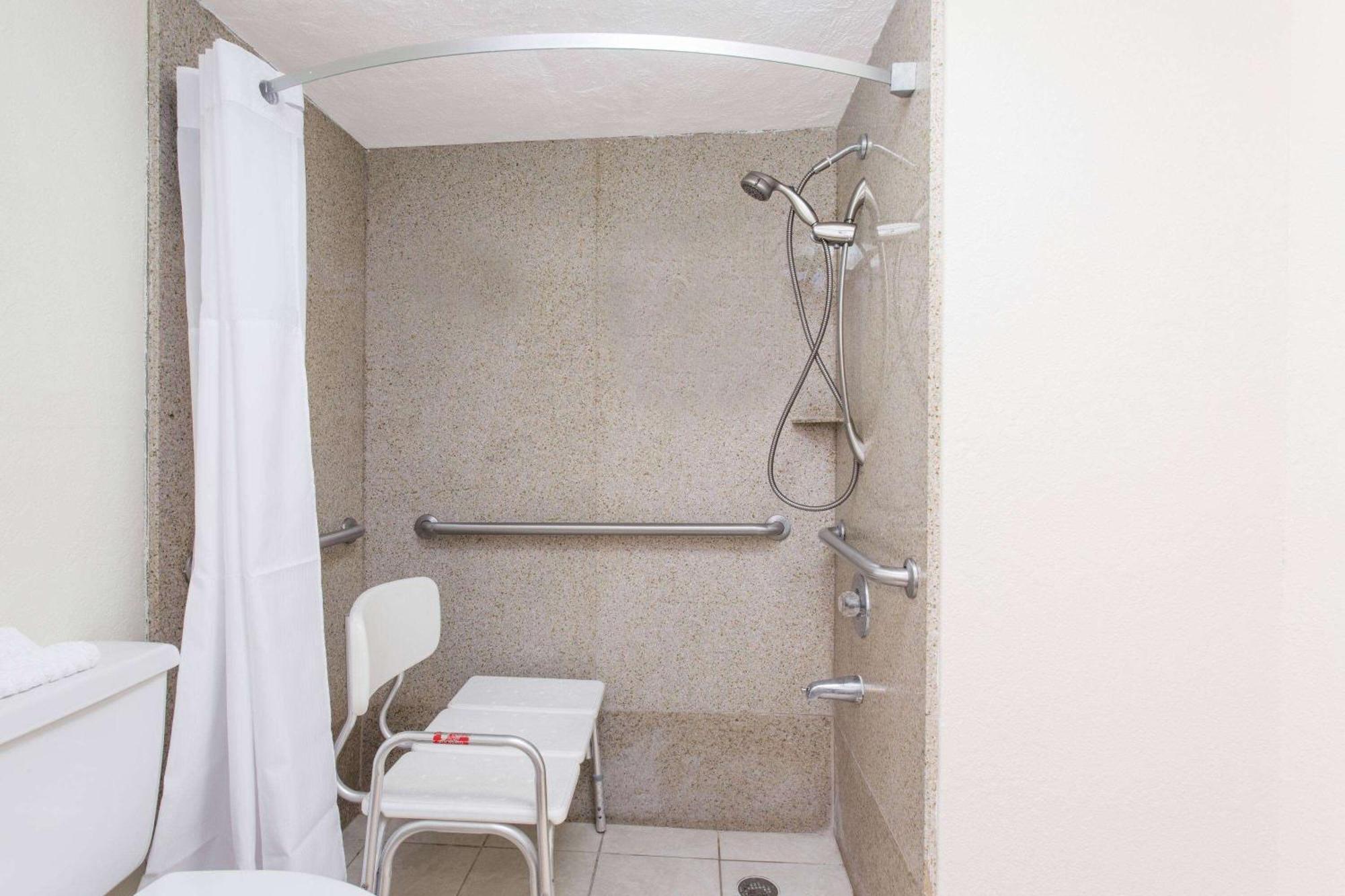 King Room Roll Shower Lounge Chair Mobility Accessible or Non-Smoking