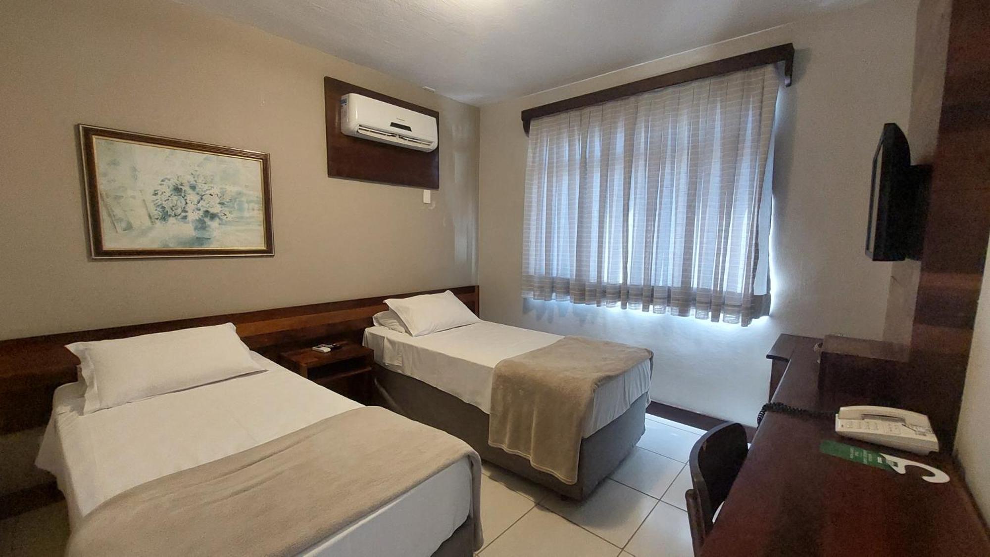 Quarto Executivo Solteiro