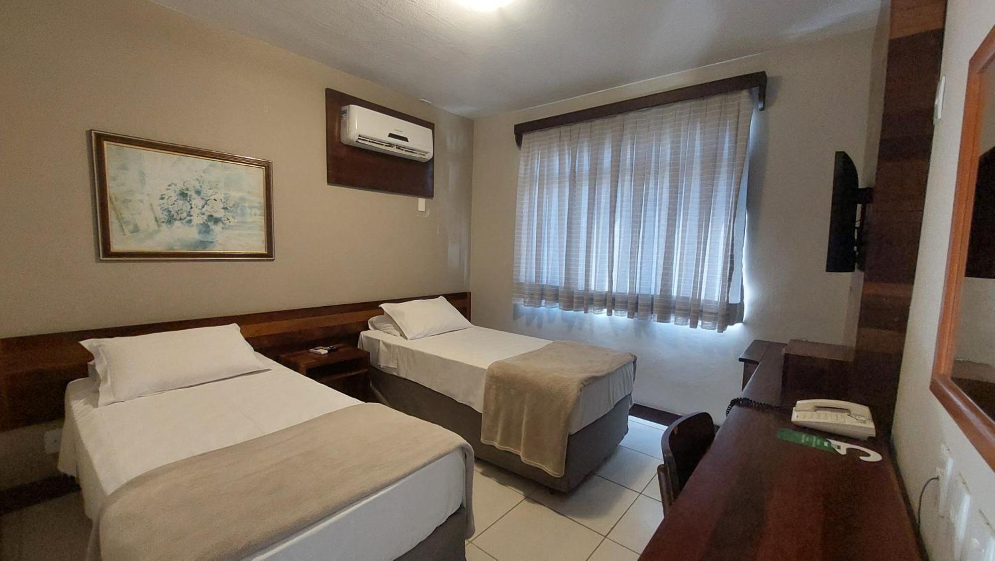 Quarto Executivo Solteiro