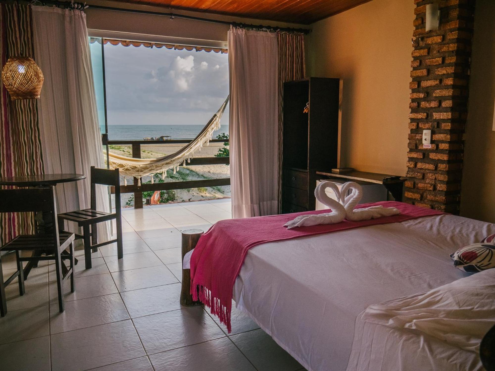 Quarto Deluxe com varanda e vista do mar
