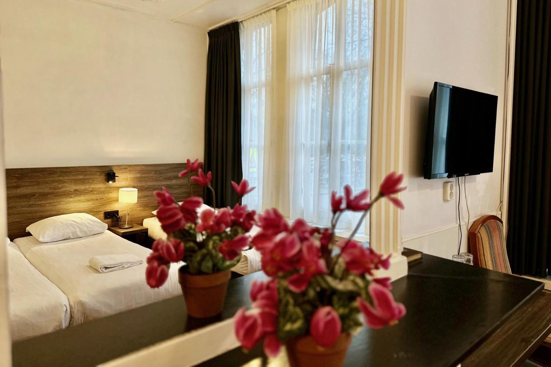 Chambre Quadruple avec Salle de Bains Privative
