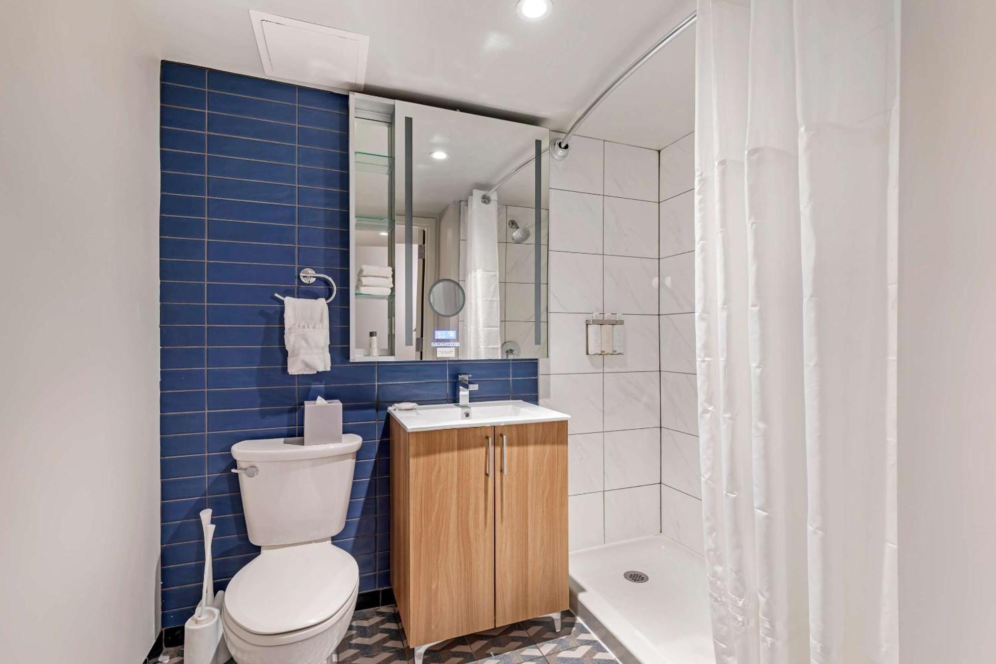 Quadruple Room Two Queen Beds Roll Shower Disability Access or Non Smoking
