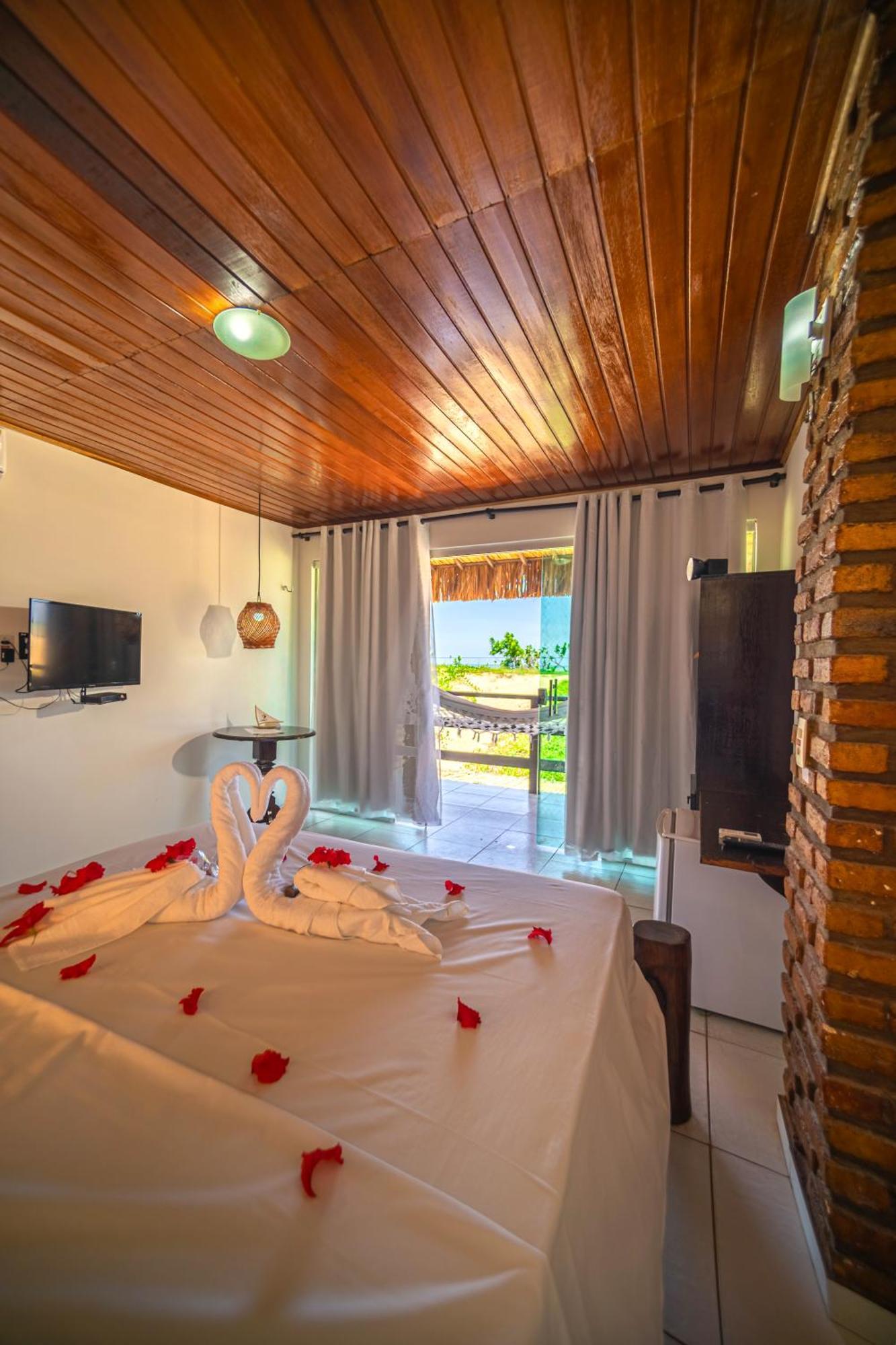 Quarto Deluxe com varanda e vista do mar