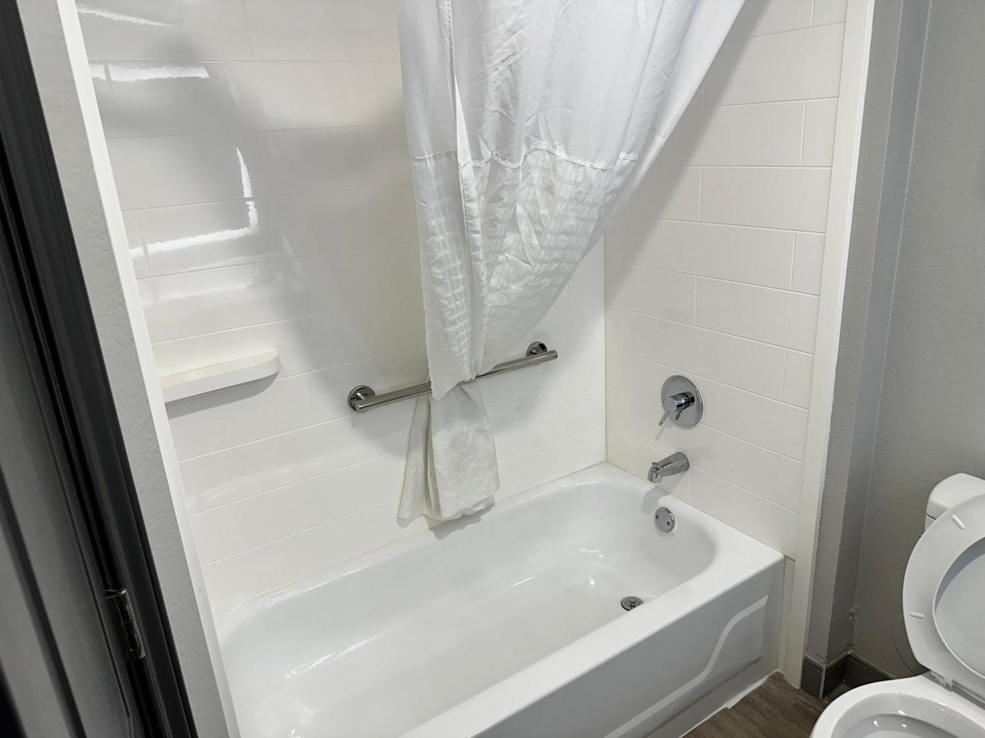 Deluxe King Room with One King Bed and Tub with Grab Bars - Mobility/Hearing Accessible