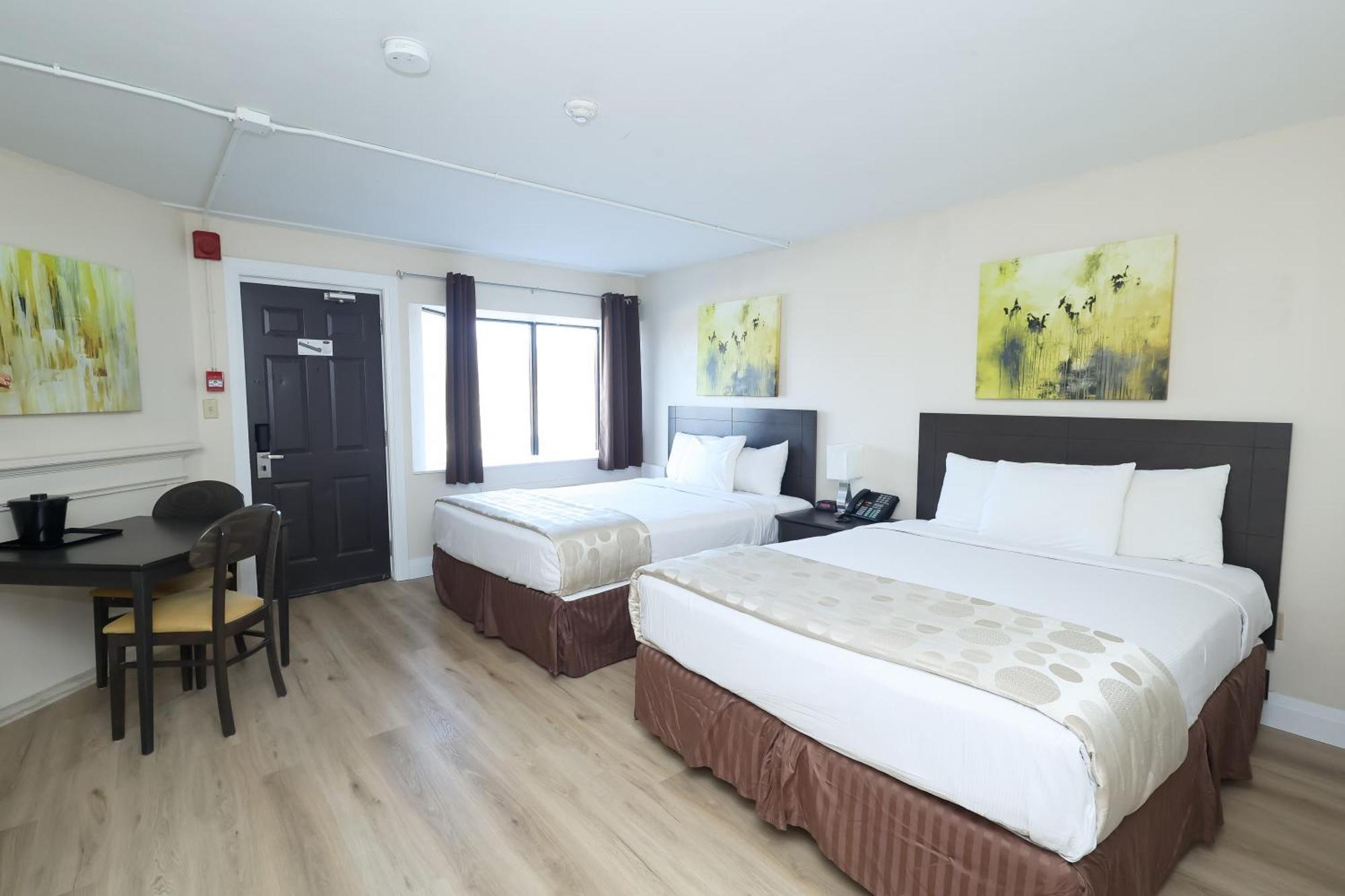 Two Queen Beds Ground floor exterior Access only