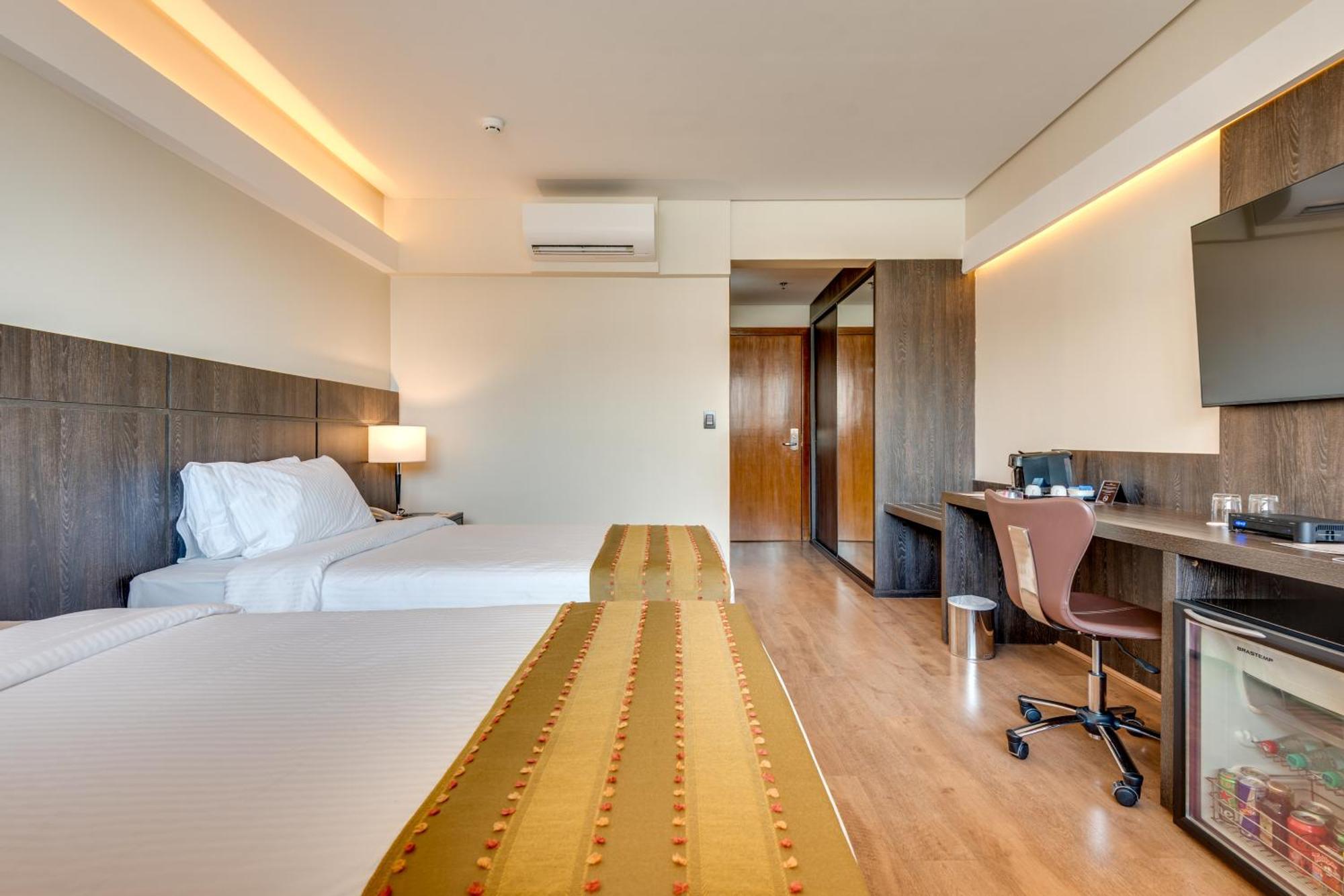 Quarto Premium com 2 Camas de Solteiro