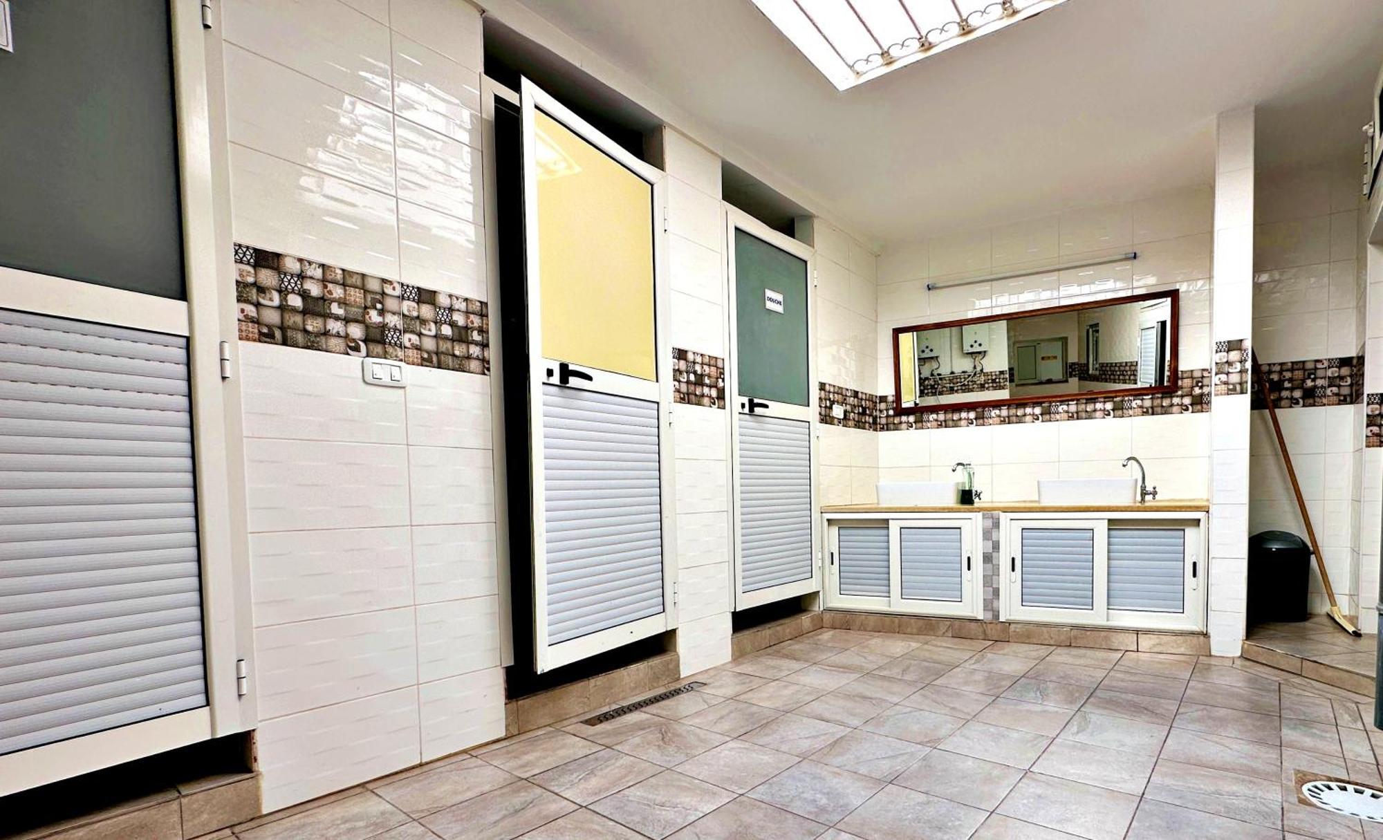 Single Room Shared Shower Toilet