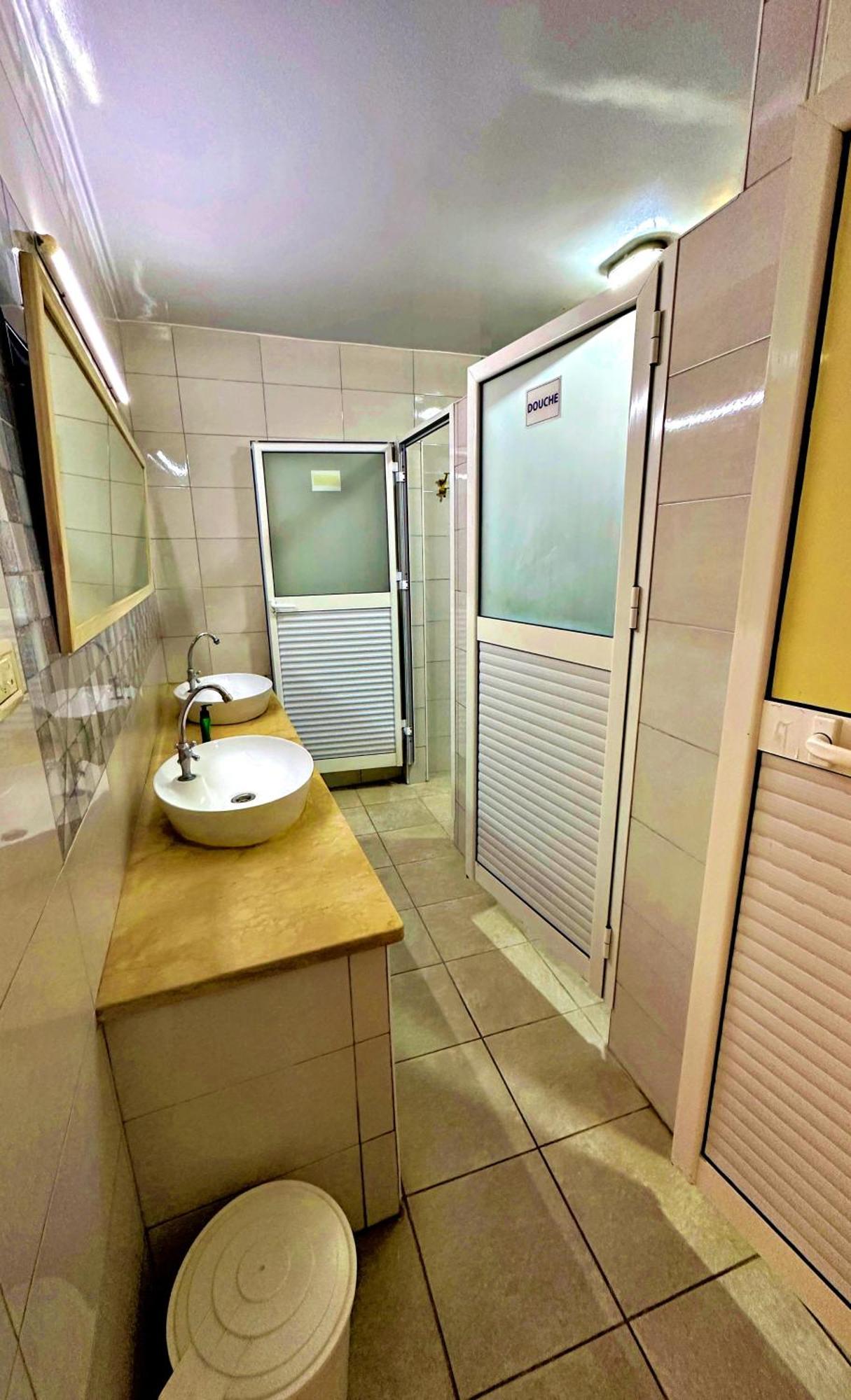 Single Room Shared Shower Toilet