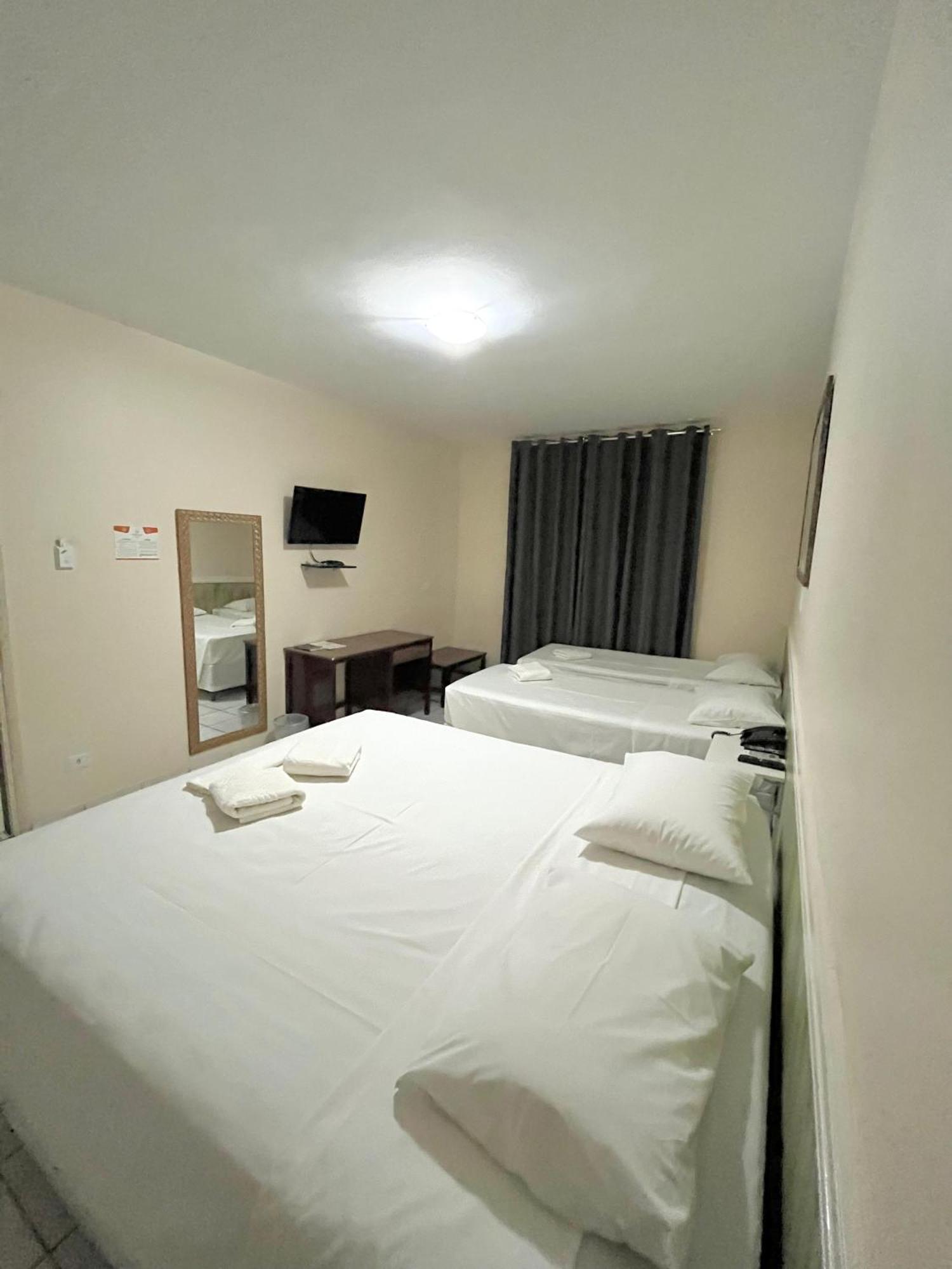 Executive Quadruple Room 1 Double bed 2 Single beds