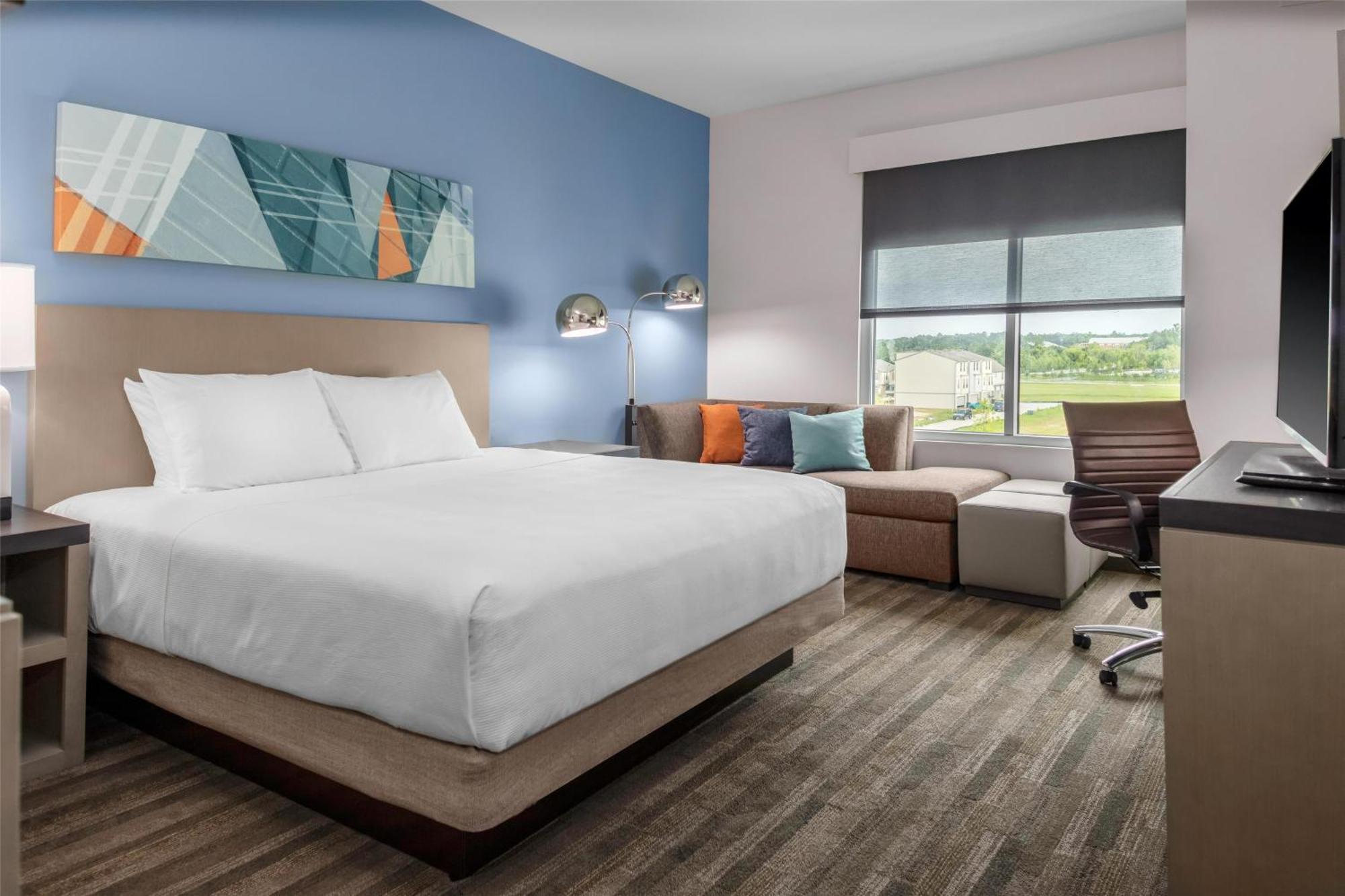 Den with One King Bed and Roll-In Shower - Mobility Access